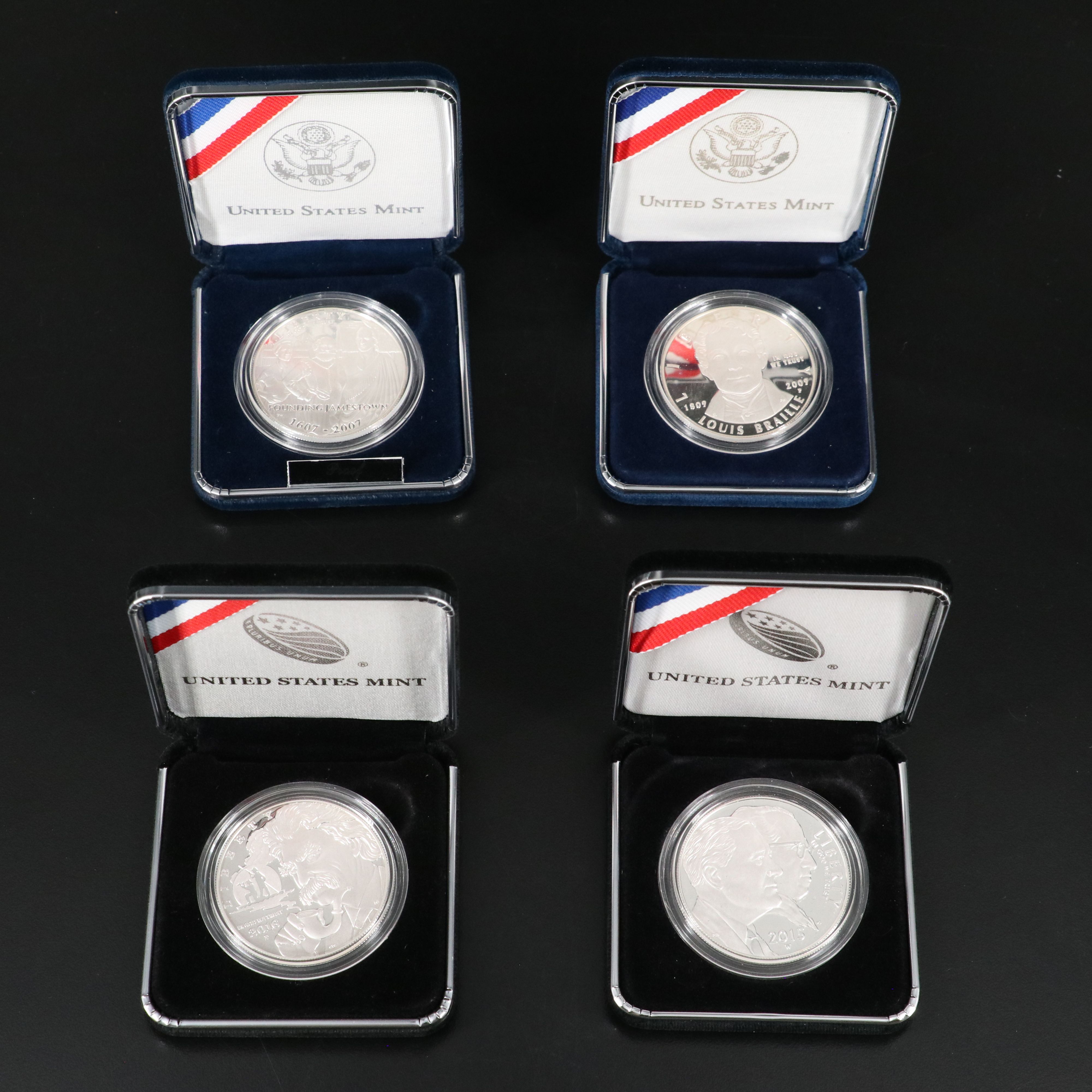 Four Different Modern Commemorative Proof Silver Dollars