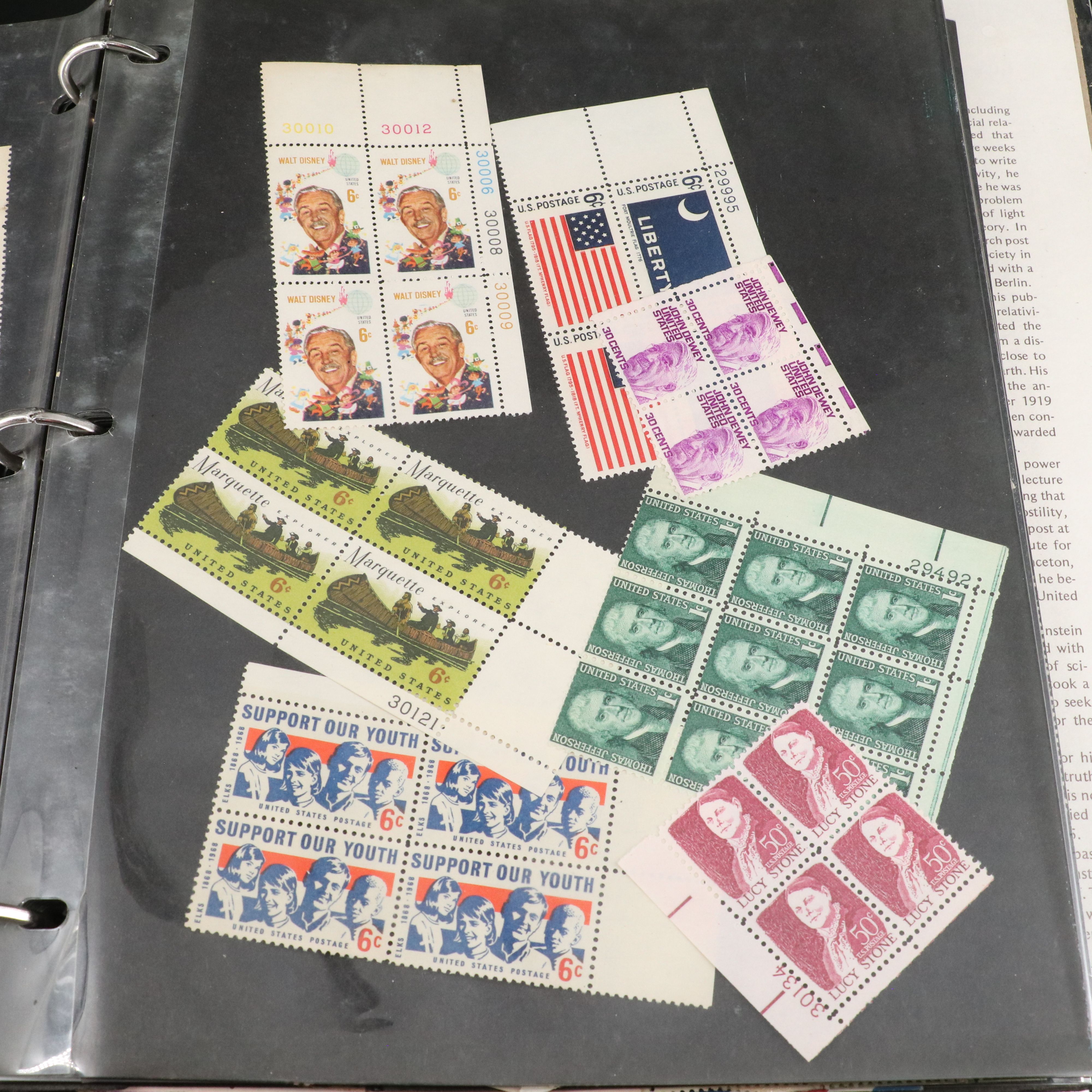 Four Notebooks with Unused United States Stamps