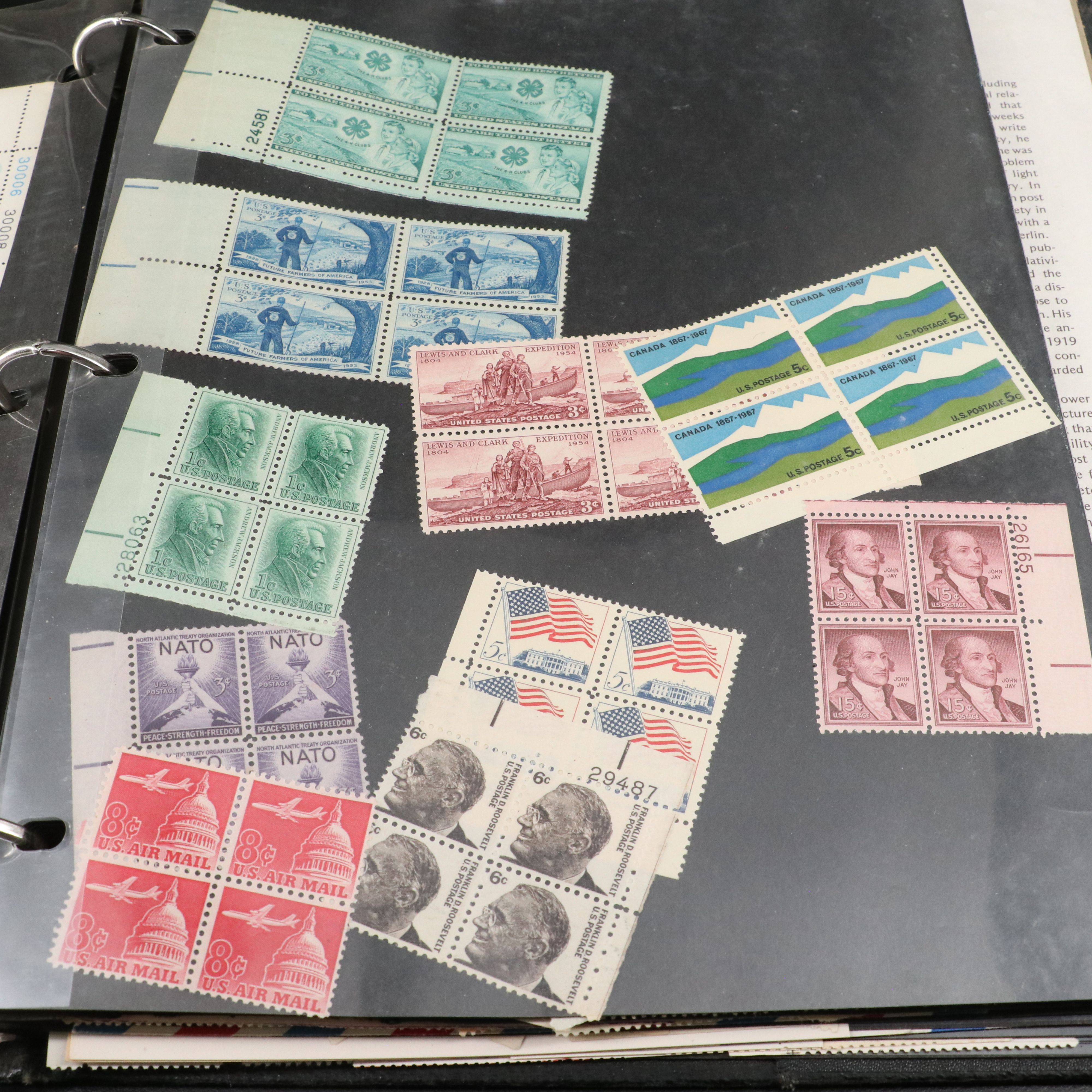 Four Notebooks with Unused United States Stamps