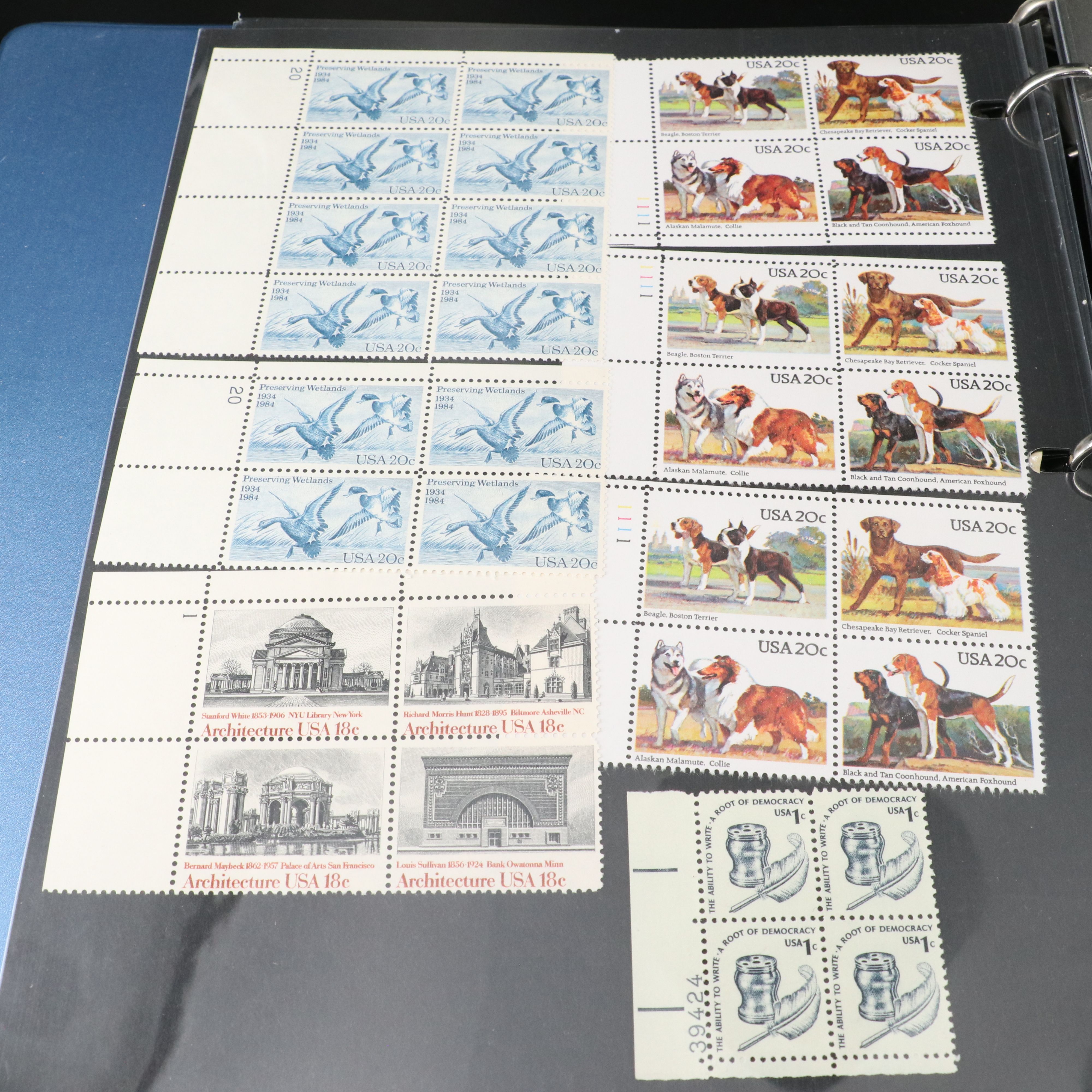 Four Notebooks with Unused United States Stamps