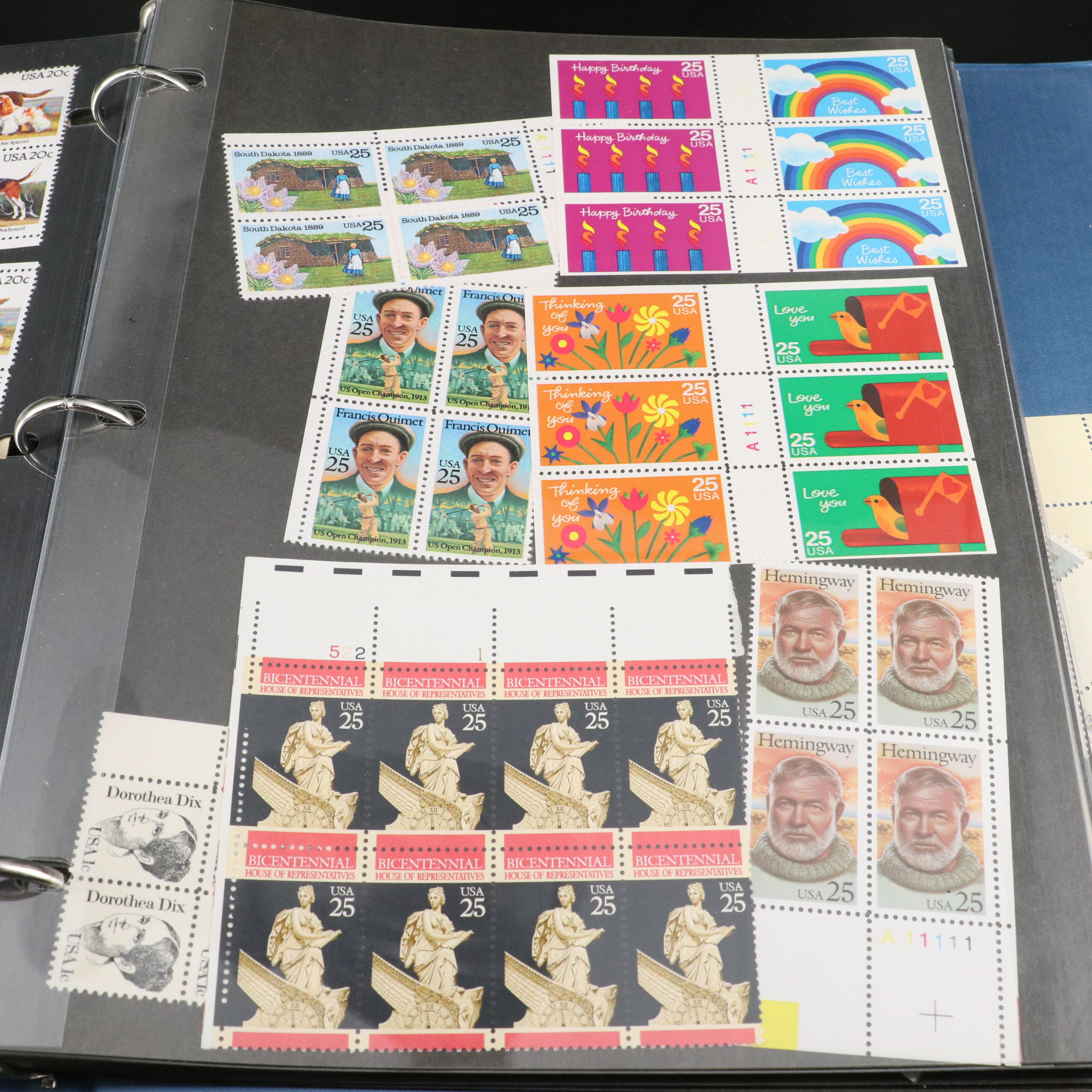 Four Notebooks with Unused United States Stamps