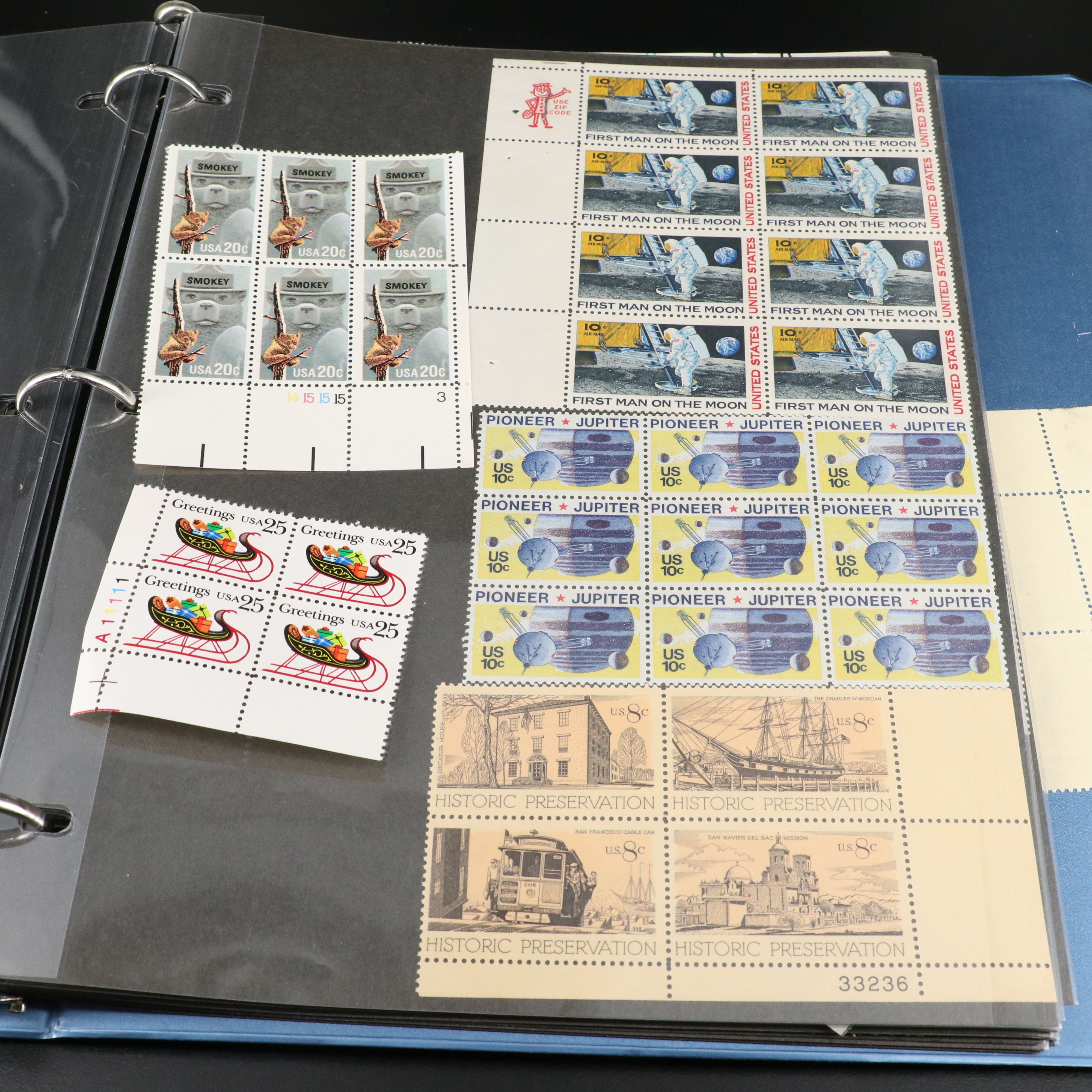 Four Notebooks with Unused United States Stamps