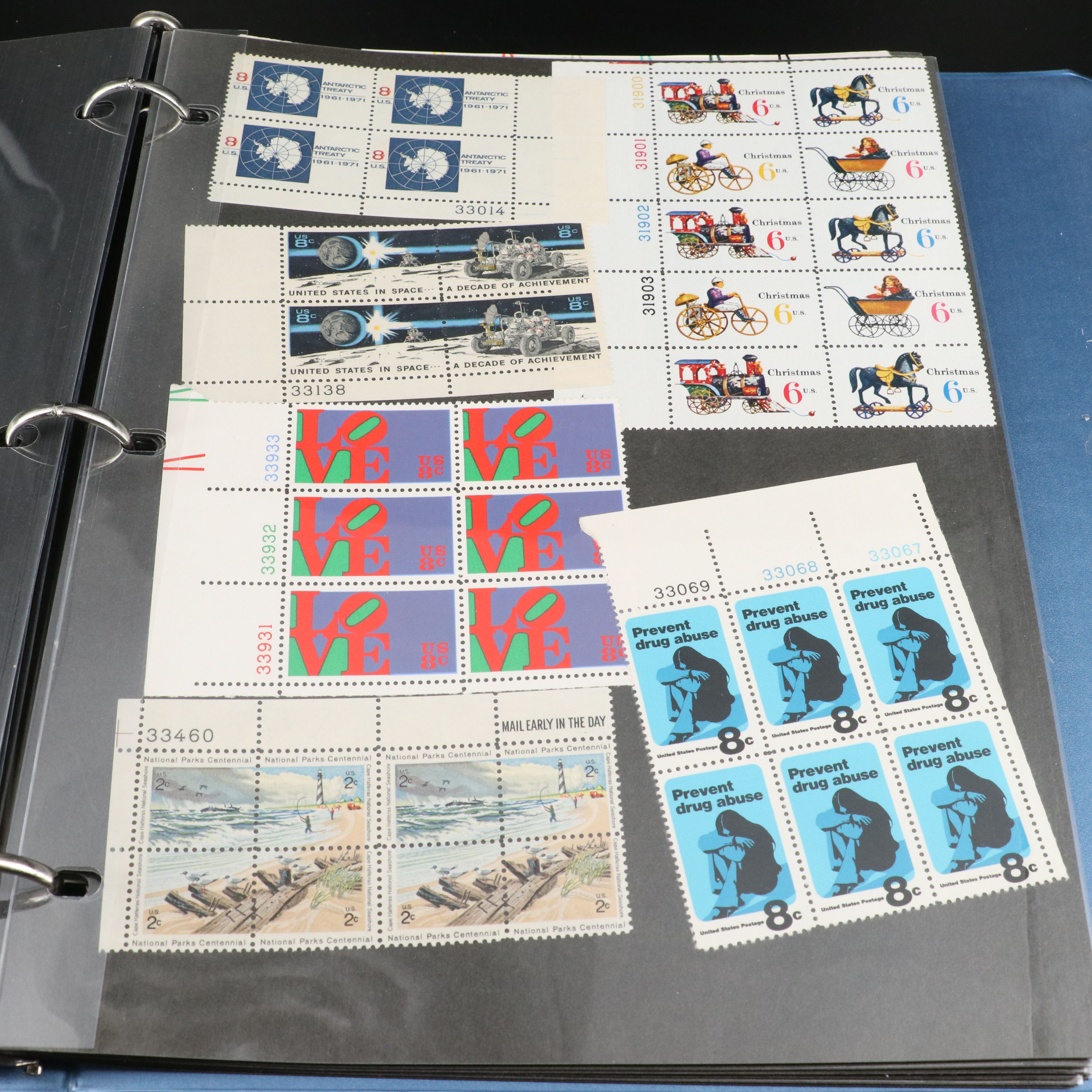 Four Notebooks with Unused United States Stamps