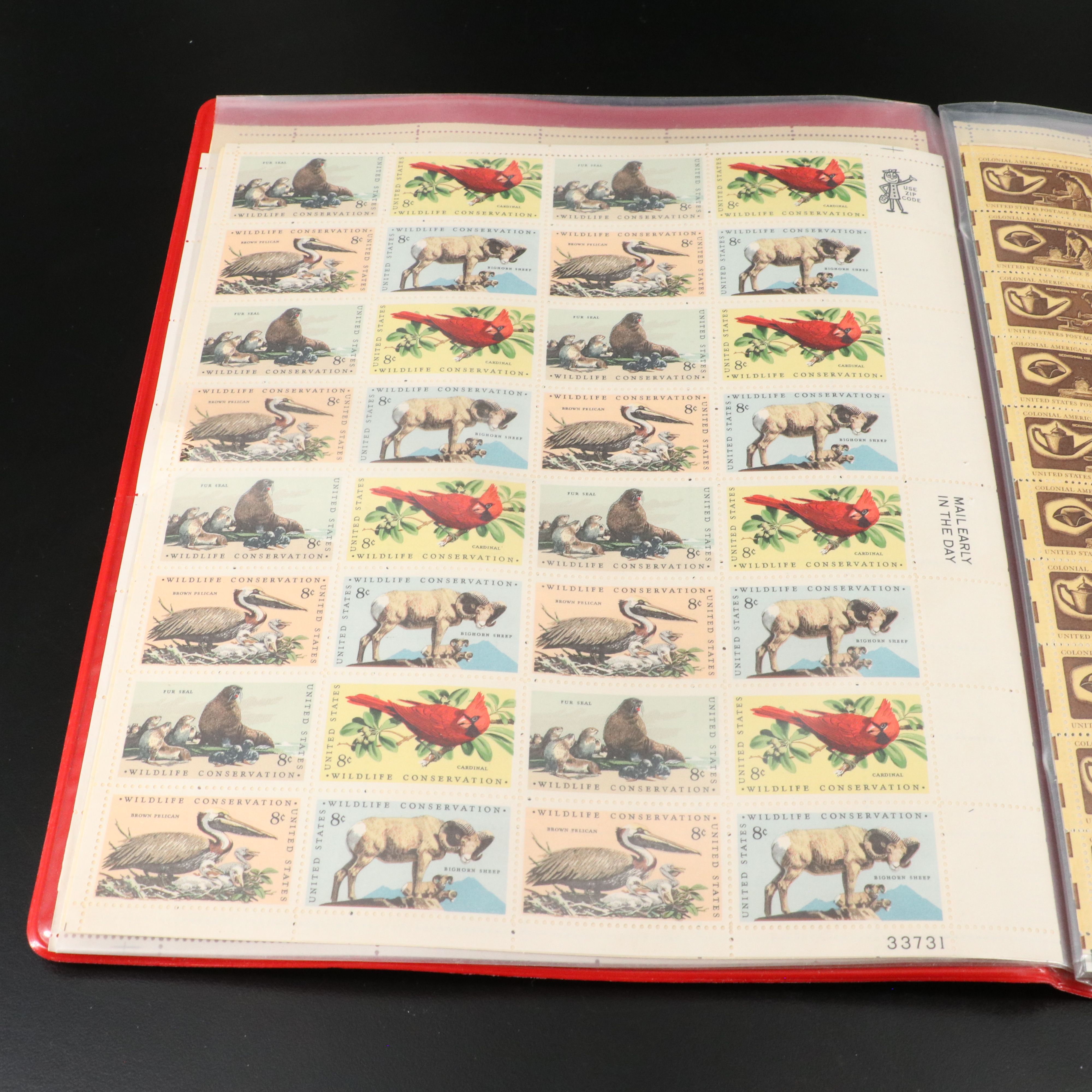 Four Notebooks with Unused United States Stamps