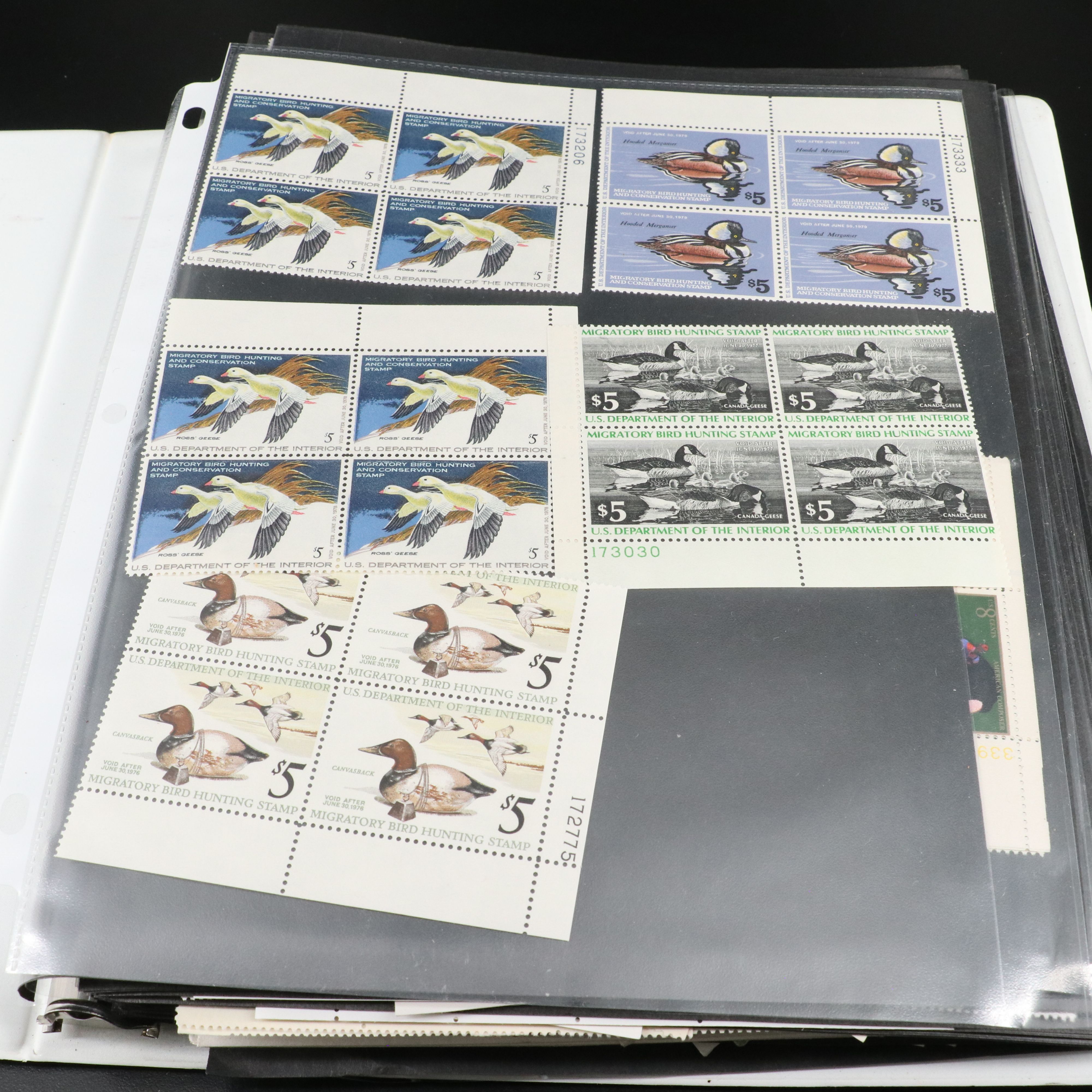 Four Notebooks with Unused United States Stamps