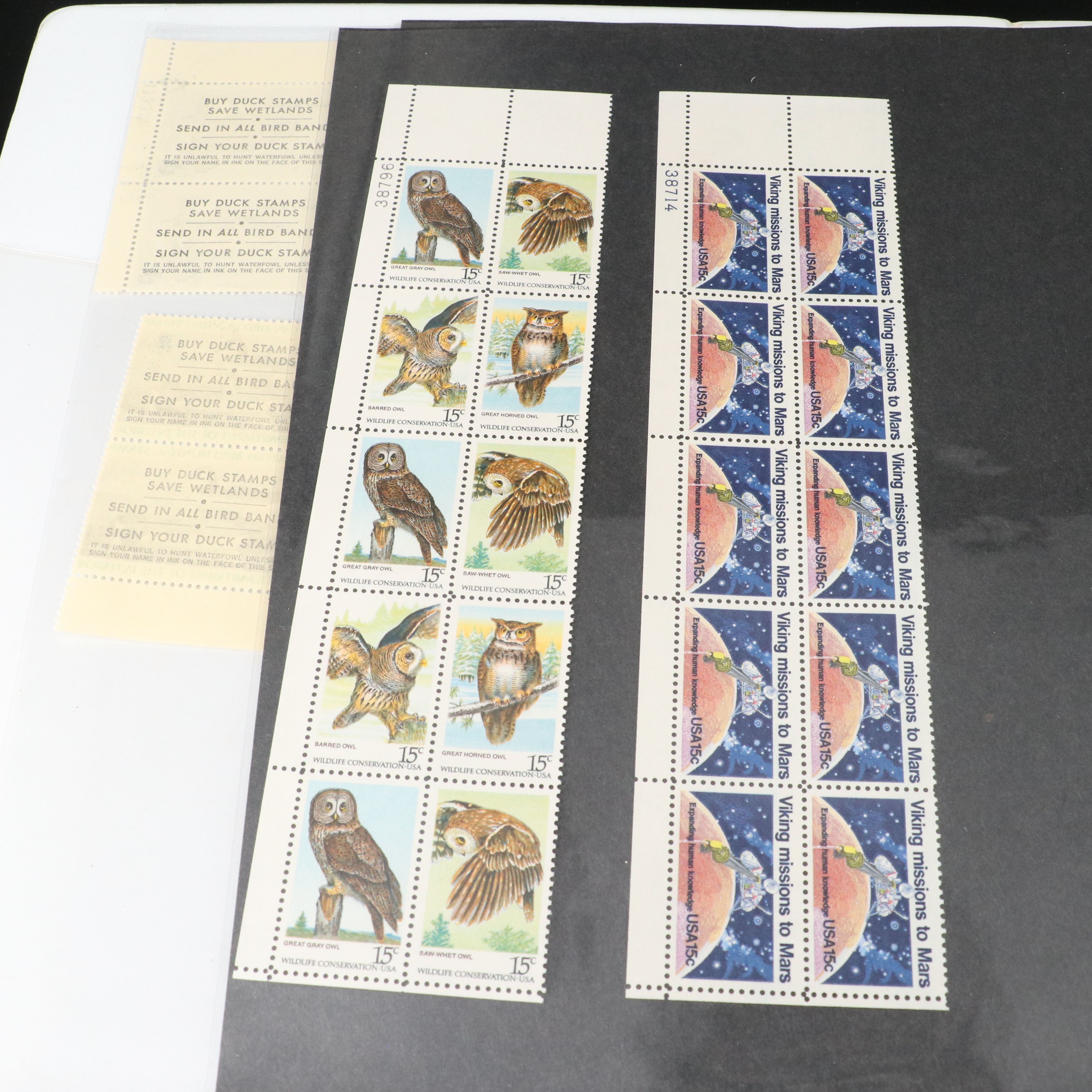 Four Notebooks with Unused United States Stamps
