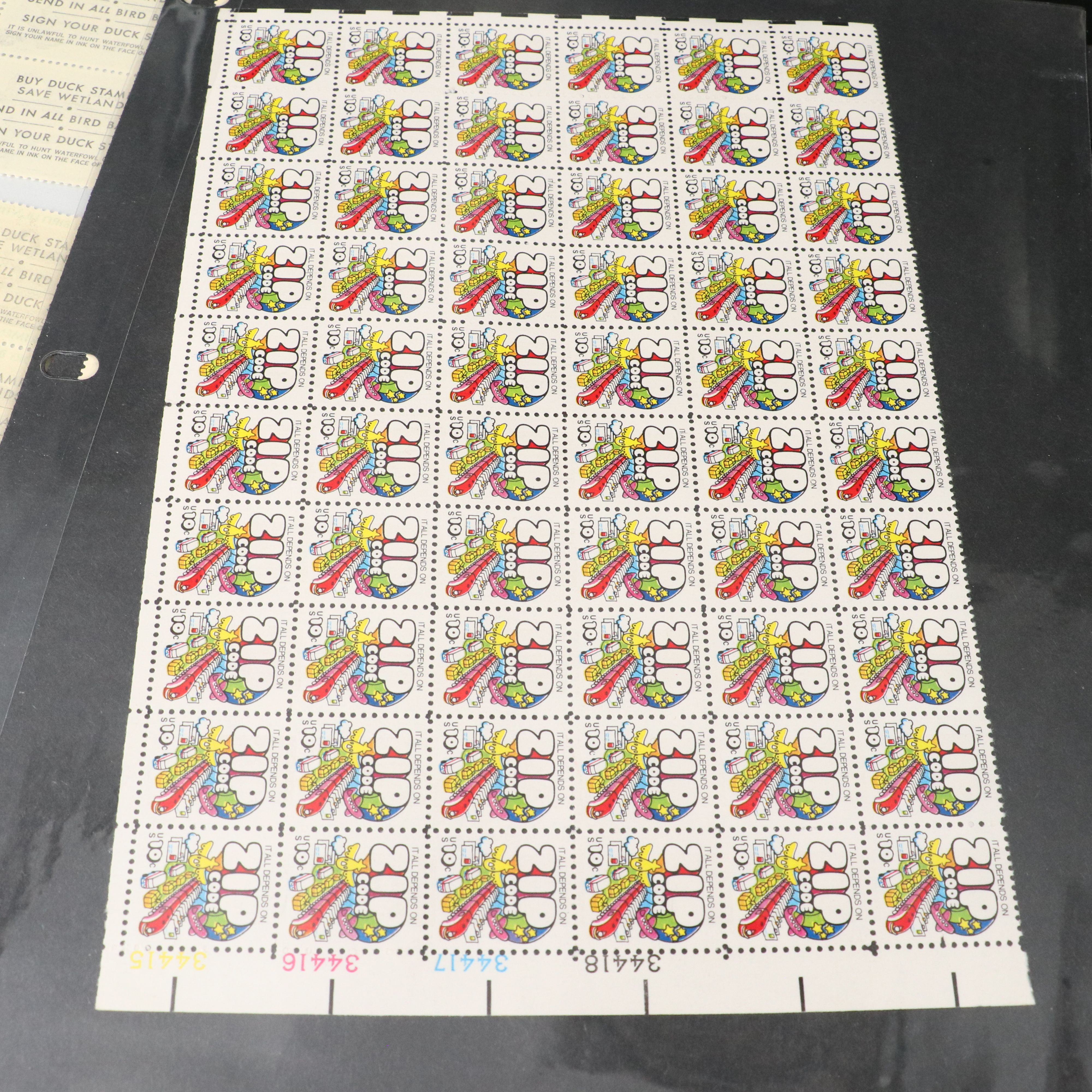 Four Notebooks with Unused United States Stamps