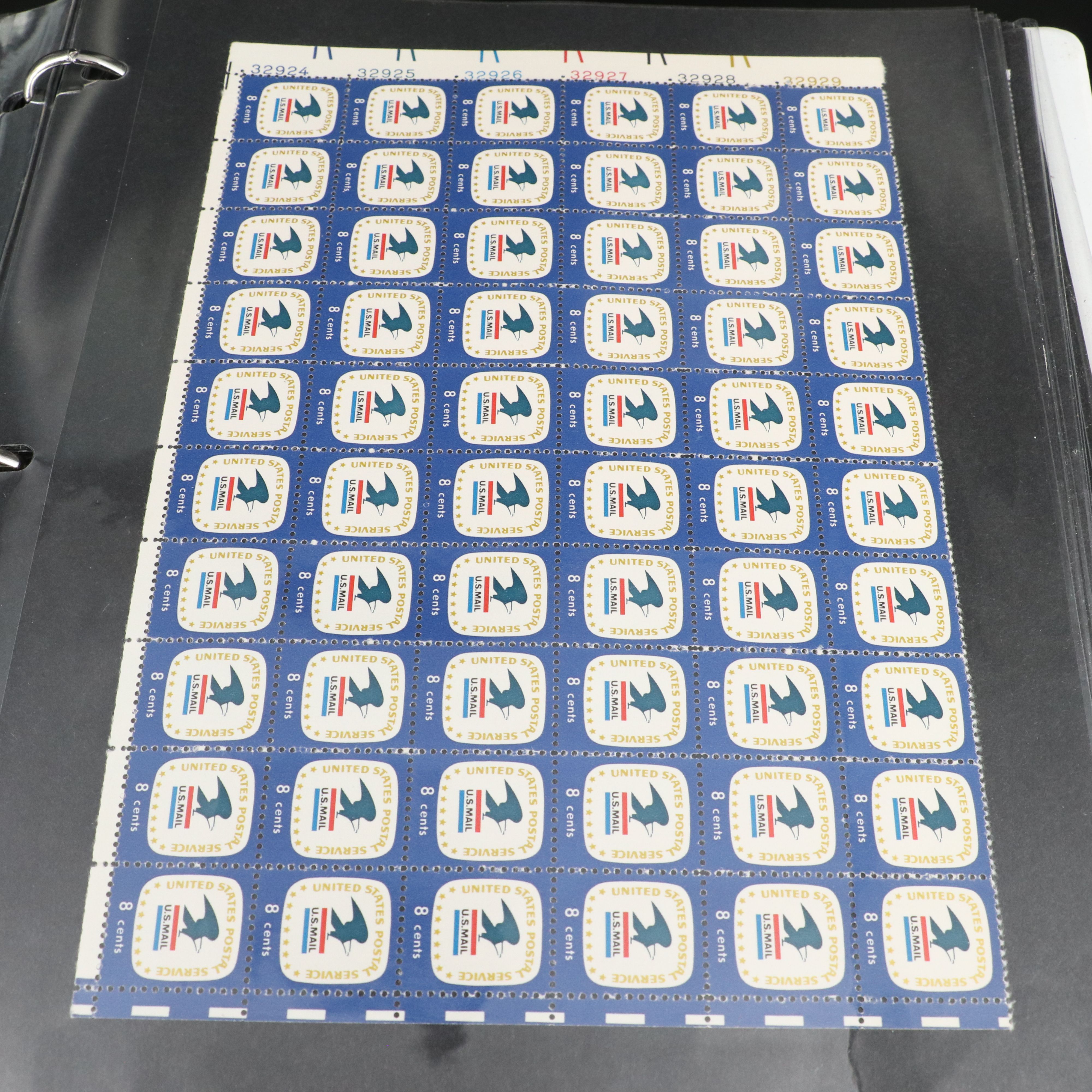 Four Notebooks with Unused United States Stamps