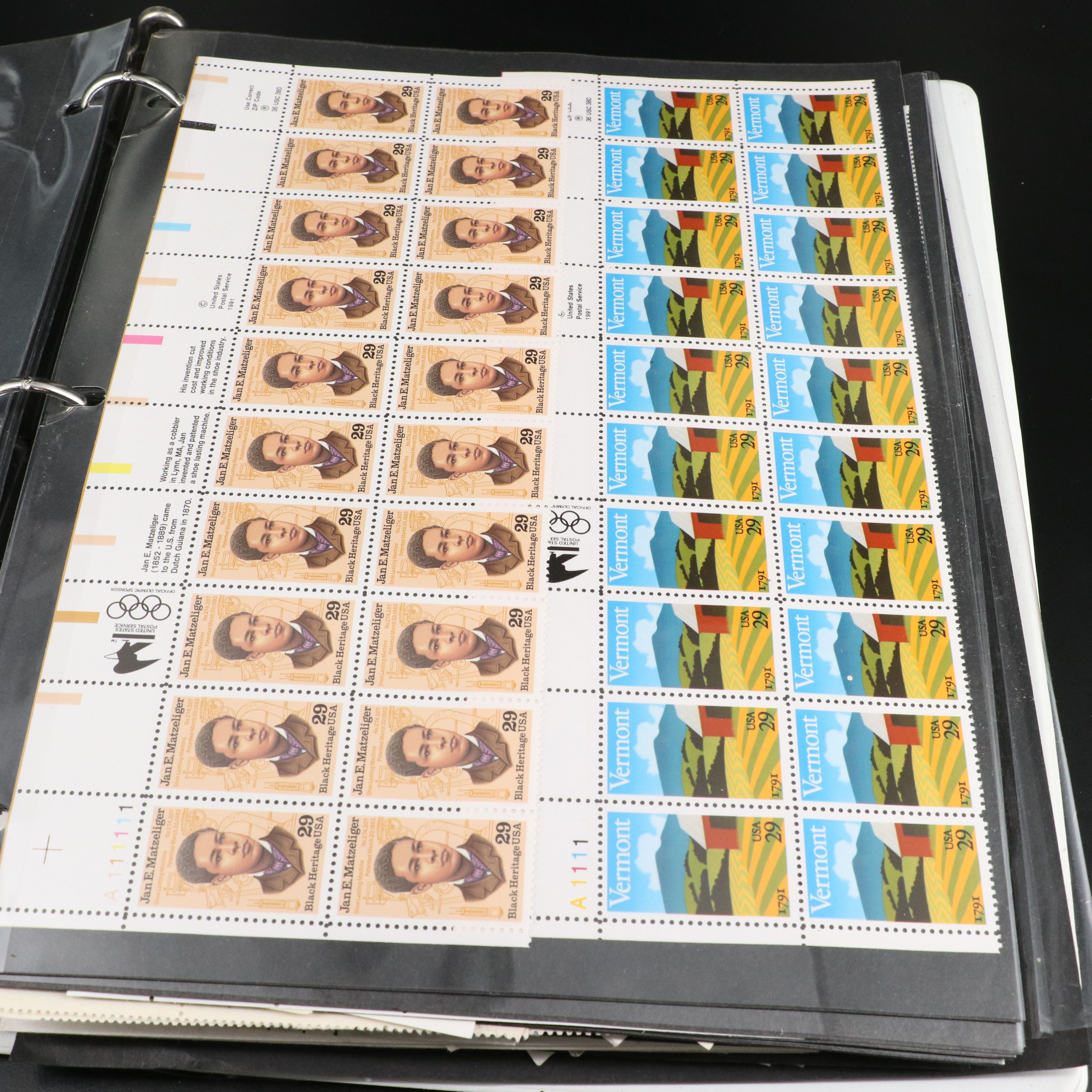 Four Notebooks with Unused United States Stamps