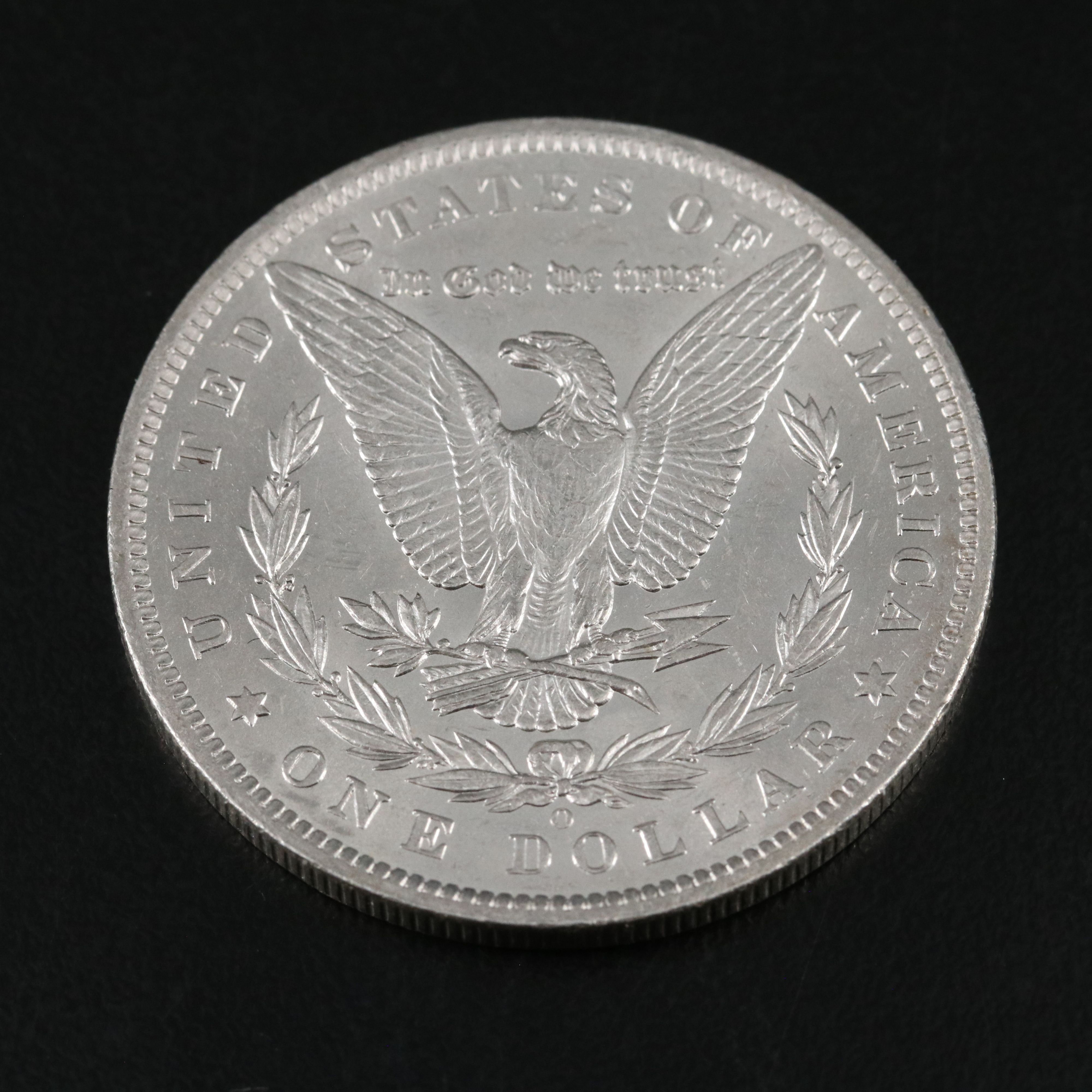 1880 and Three 1884-O Morgan Silver Dollars