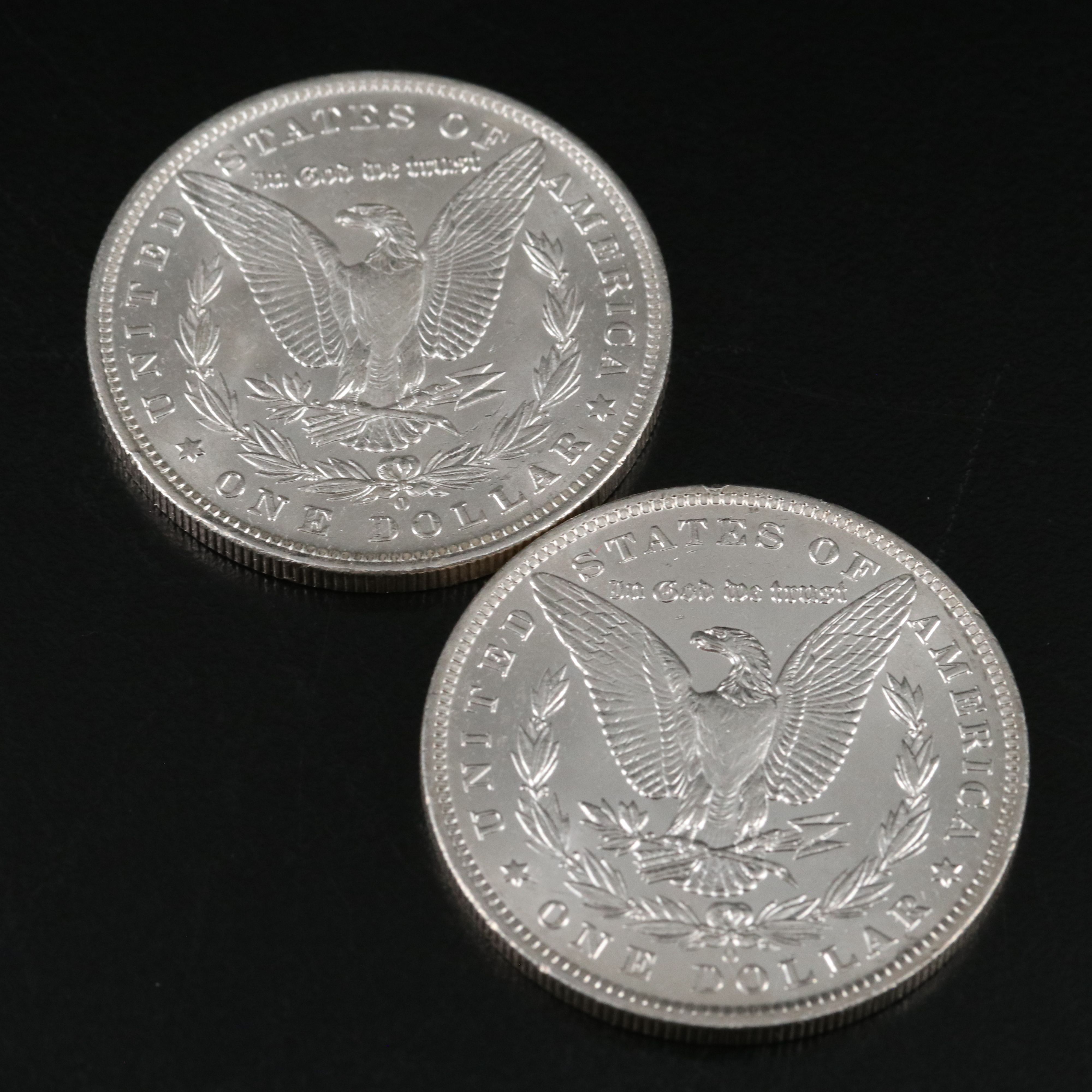 1880 and Three 1884-O Morgan Silver Dollars