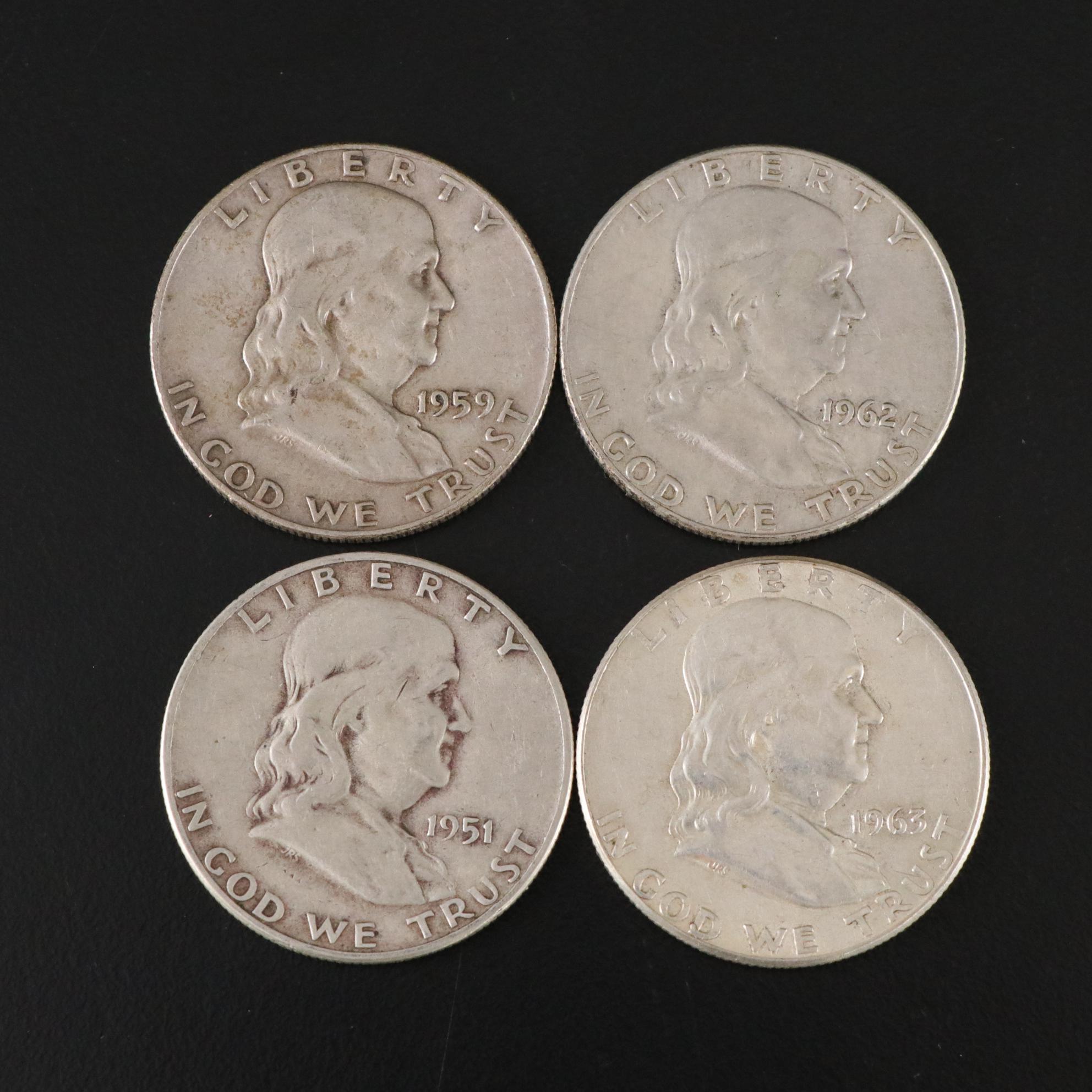 Fifteen Franklin Half Dollars and Four 1964 Kennedy Silver Half Dollars