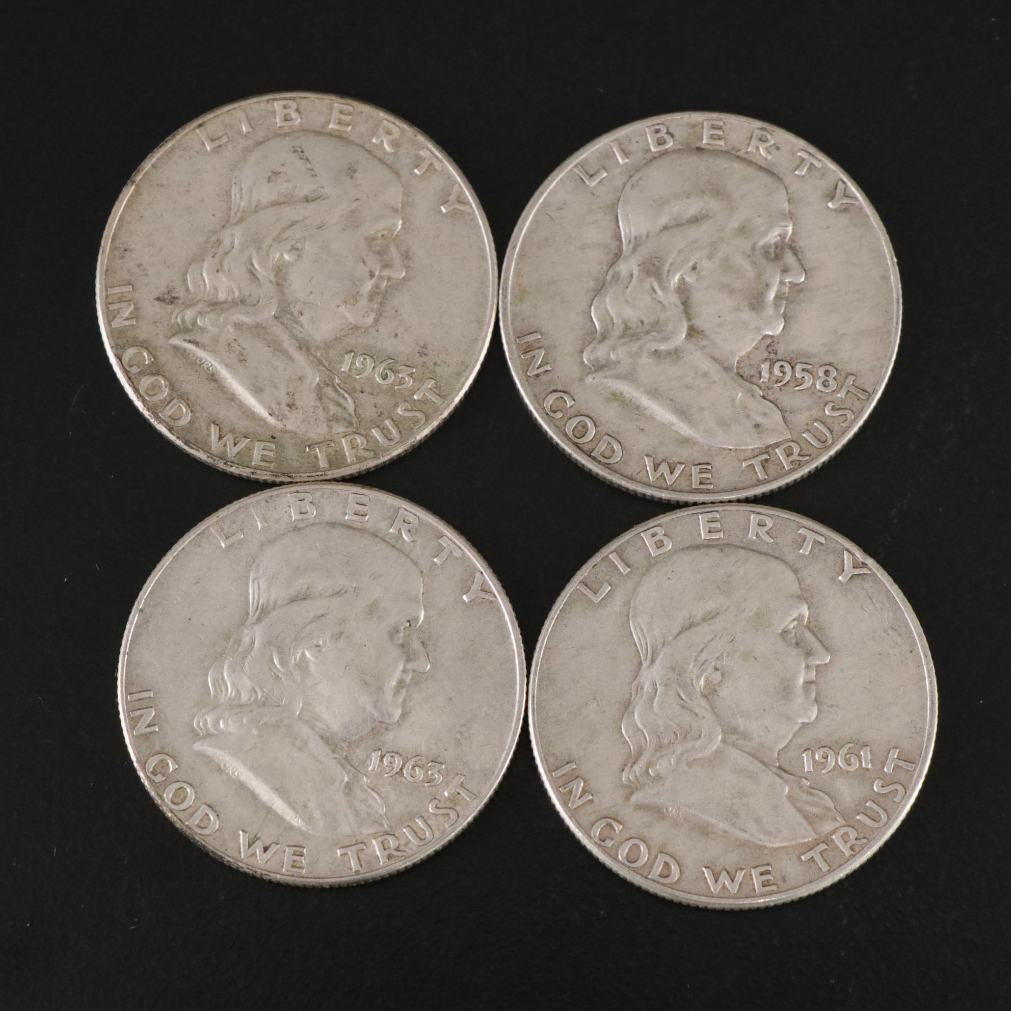 Fifteen Franklin Half Dollars and Four 1964 Kennedy Silver Half Dollars
