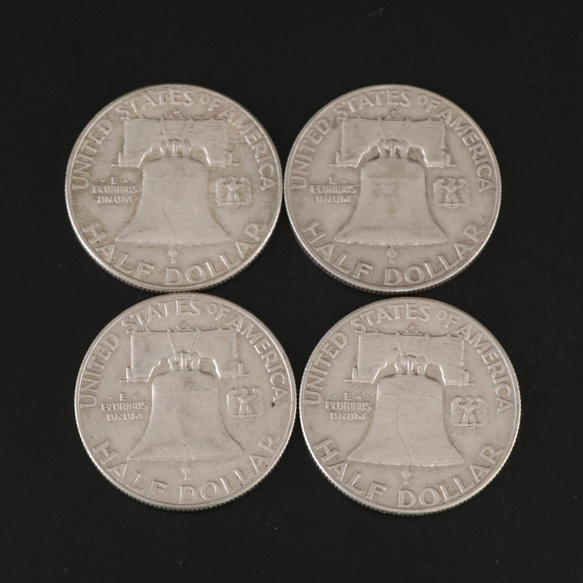 Fifteen Franklin Half Dollars and Four 1964 Kennedy Silver Half Dollars