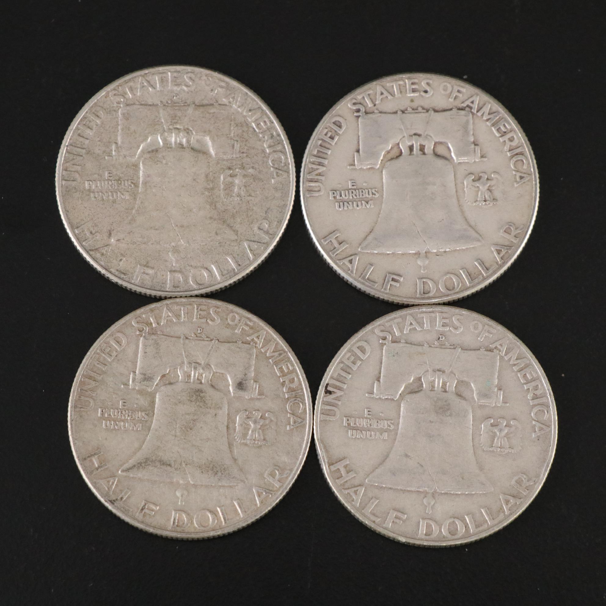 Fifteen Franklin Half Dollars and Four 1964 Kennedy Silver Half Dollars