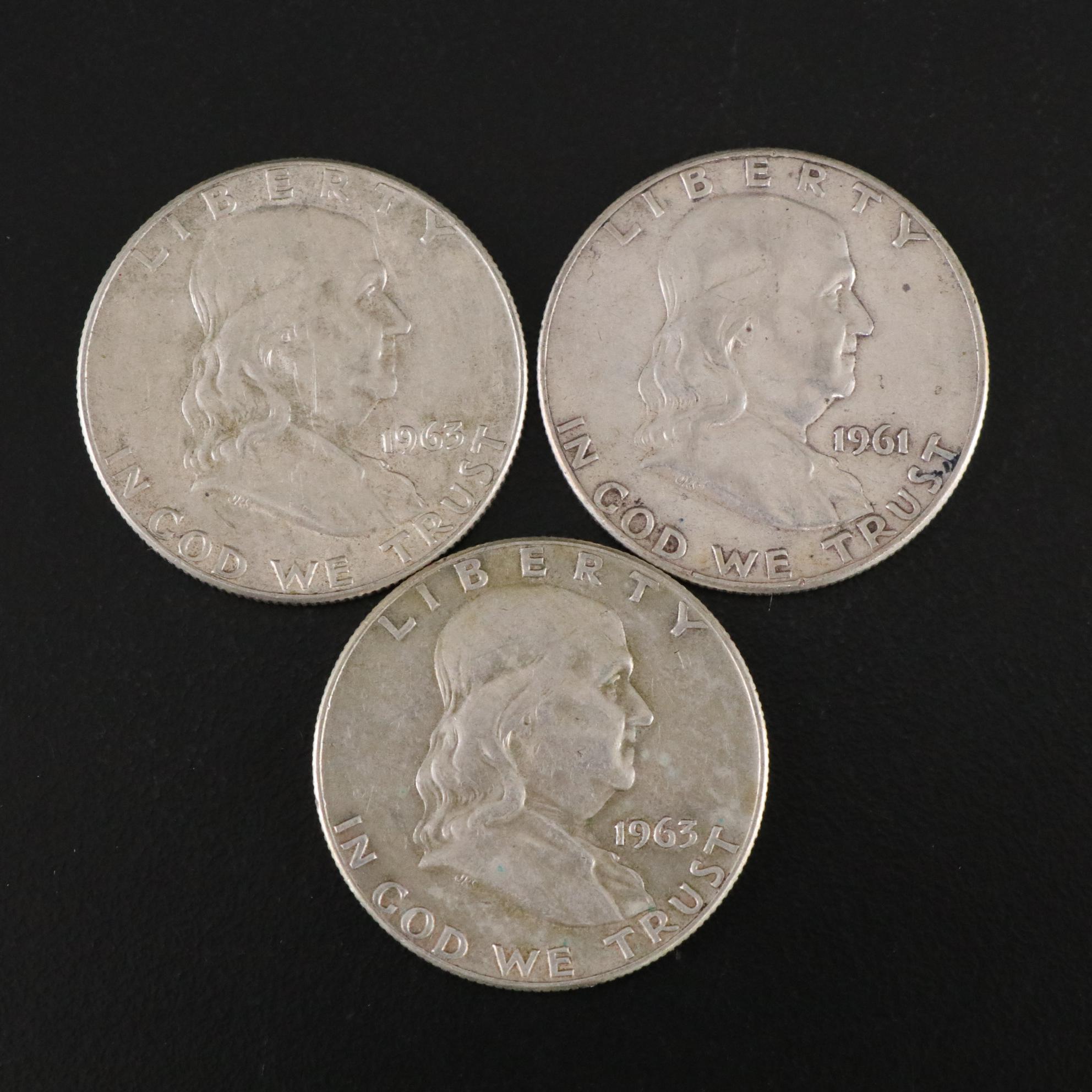 Fifteen Franklin Half Dollars and Four 1964 Kennedy Silver Half Dollars