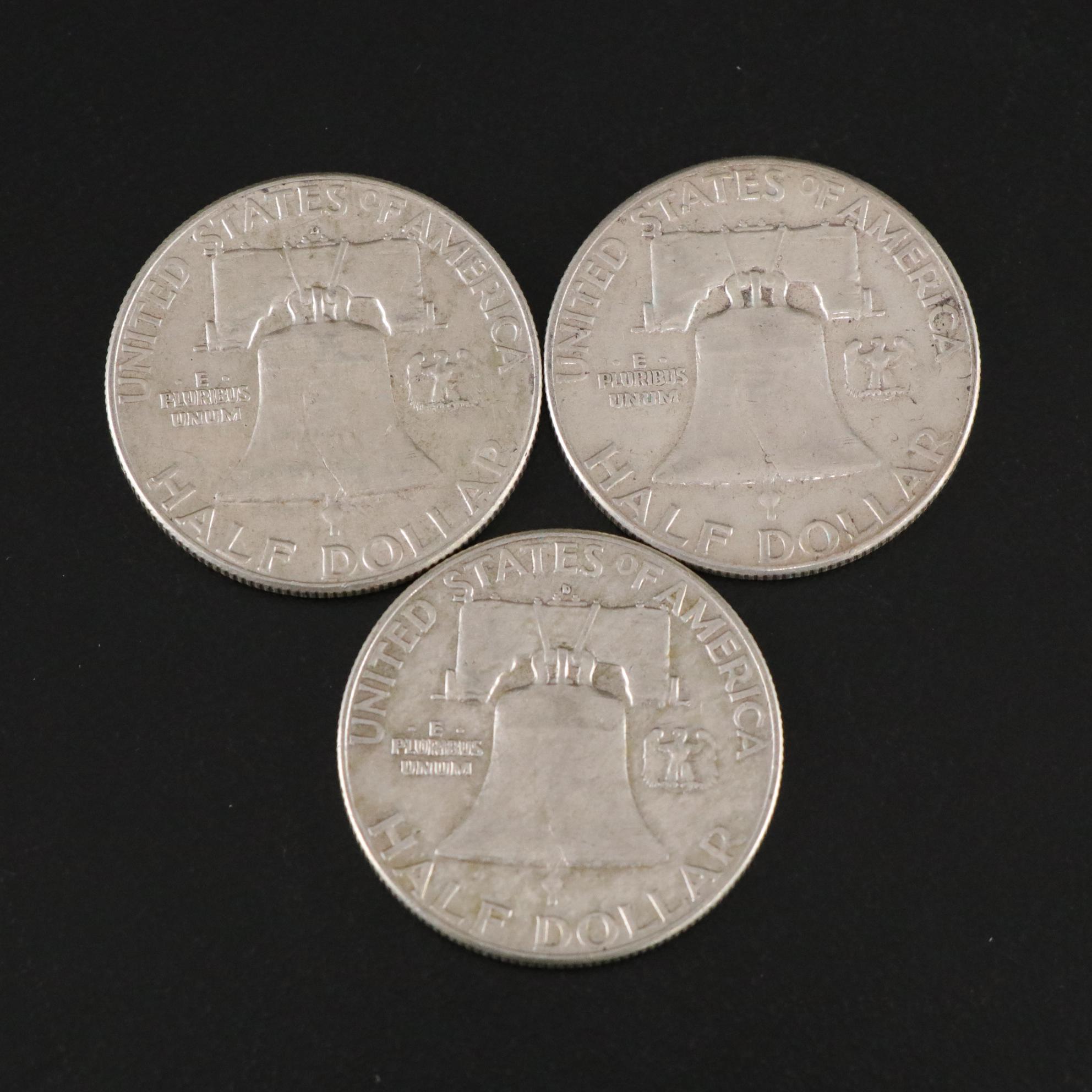 Fifteen Franklin Half Dollars and Four 1964 Kennedy Silver Half Dollars