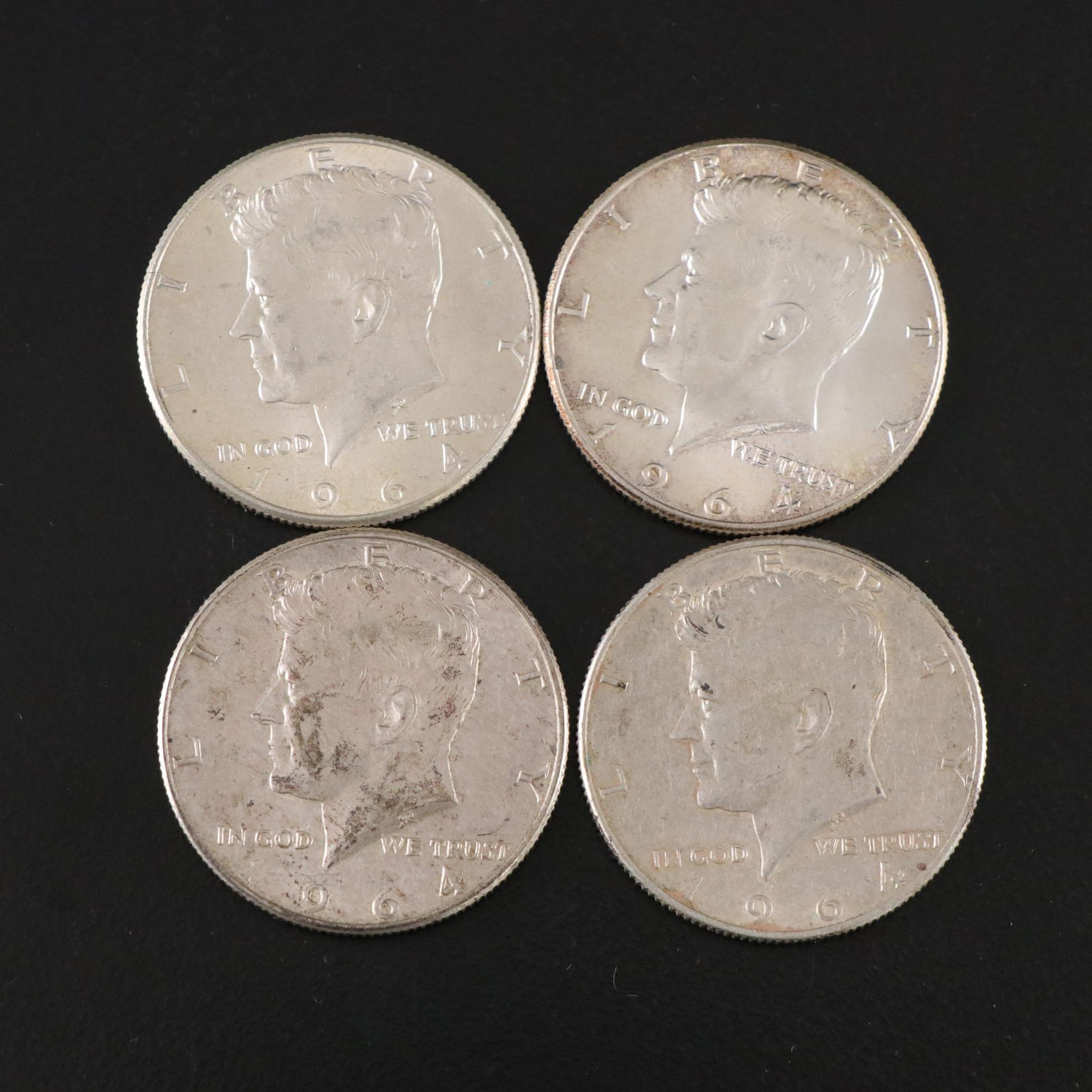 Fifteen Franklin Half Dollars and Four 1964 Kennedy Silver Half Dollars