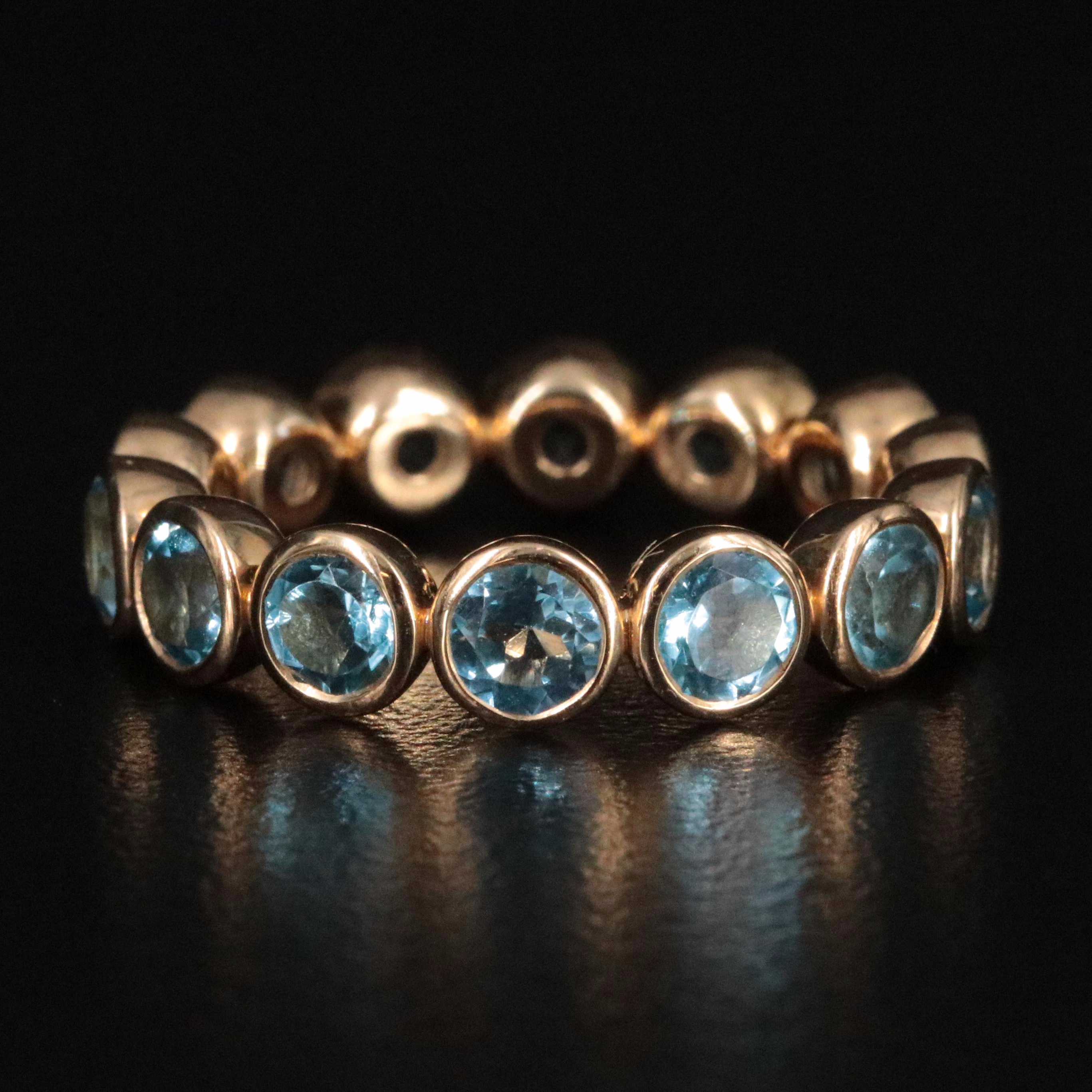 18K Swiss Blue Topaz Eternity Band
