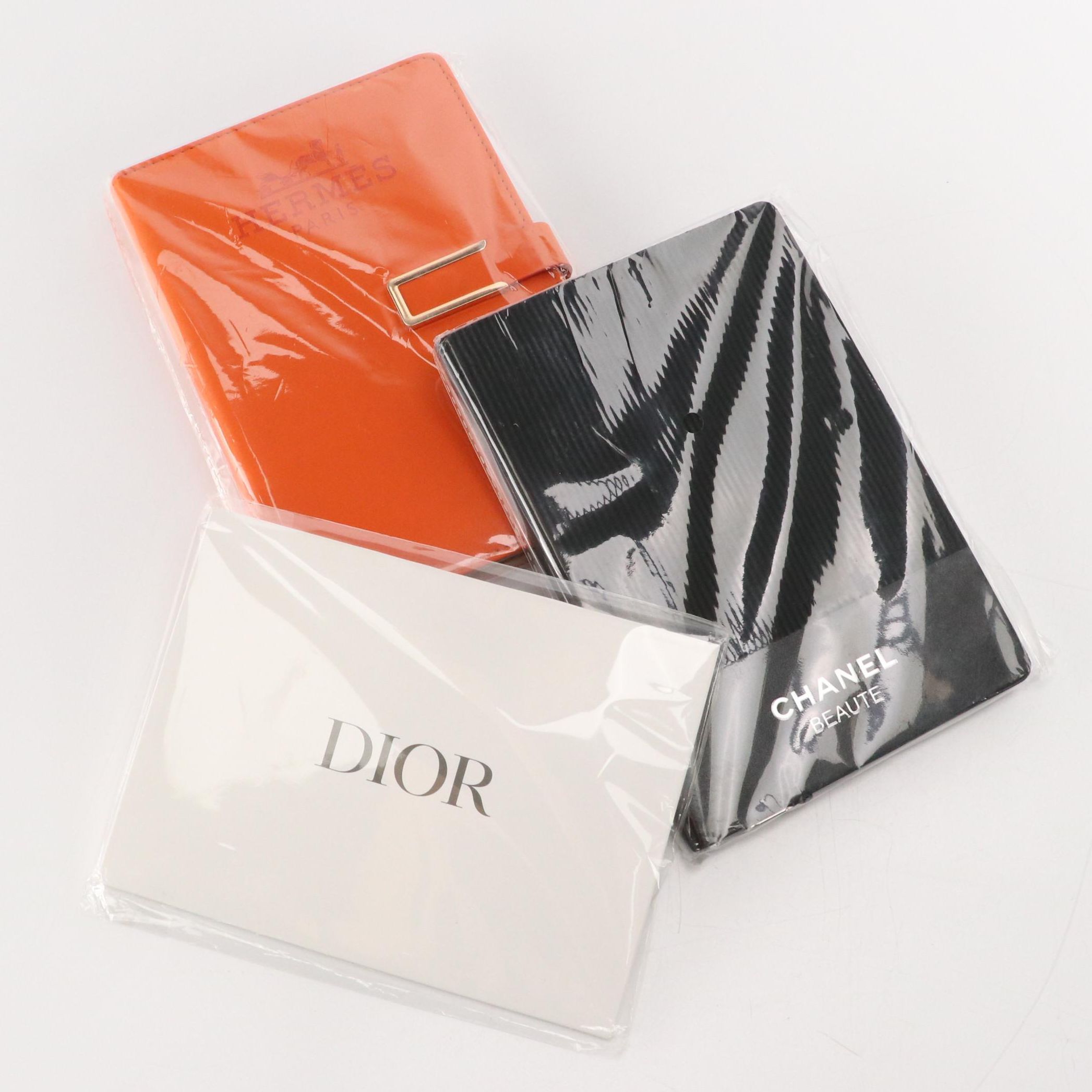 Hermès, Chanel Beauté and Dior Promotional Notebooks in Packaging