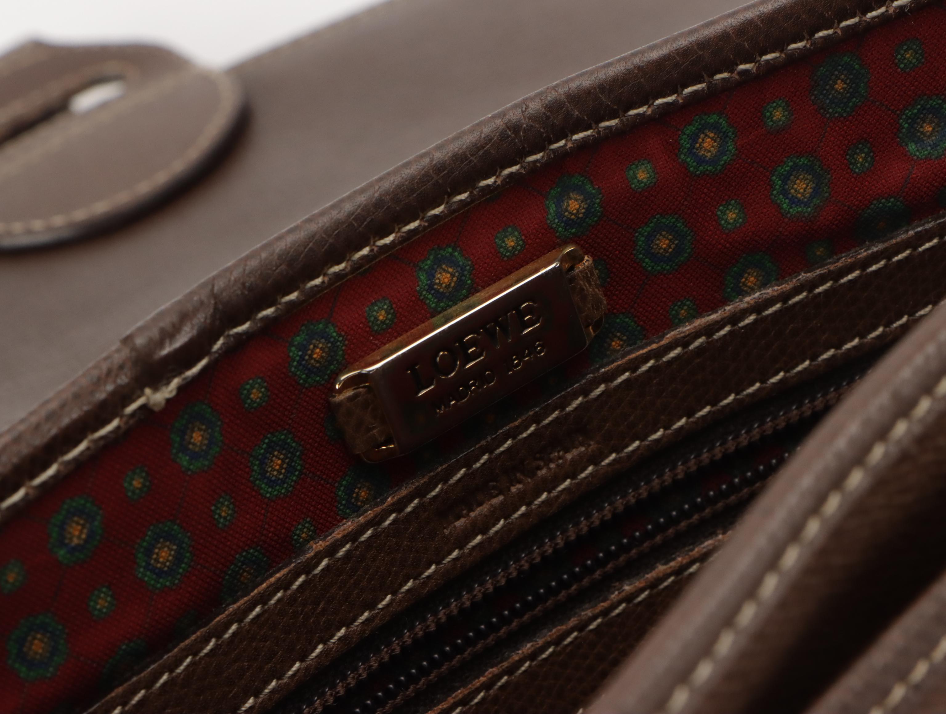 Loewe Vintage Anagram Embossed Crossbody Saddle Bag in Brown Leather, With Box