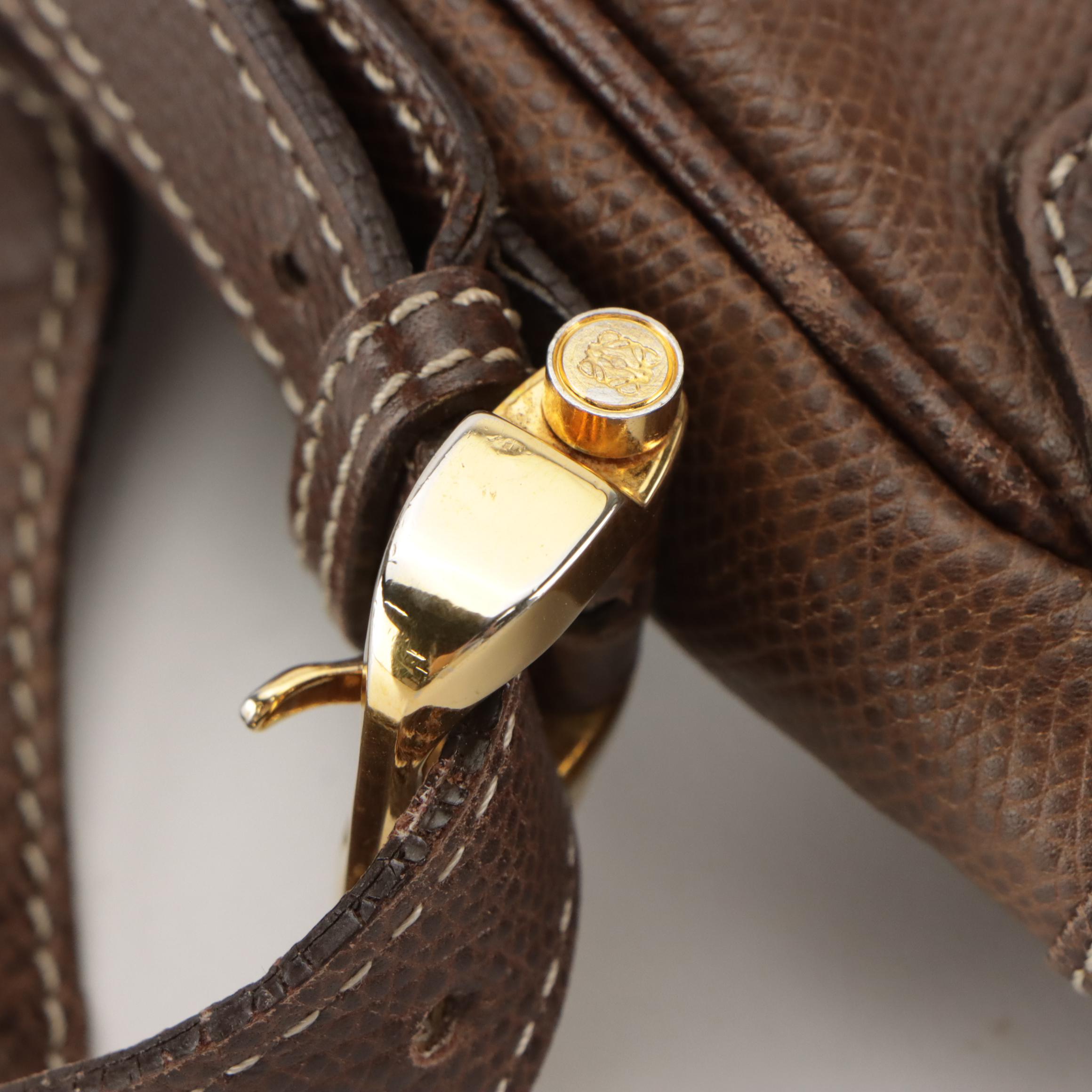 Loewe Vintage Anagram Embossed Crossbody Saddle Bag in Brown Leather, With Box