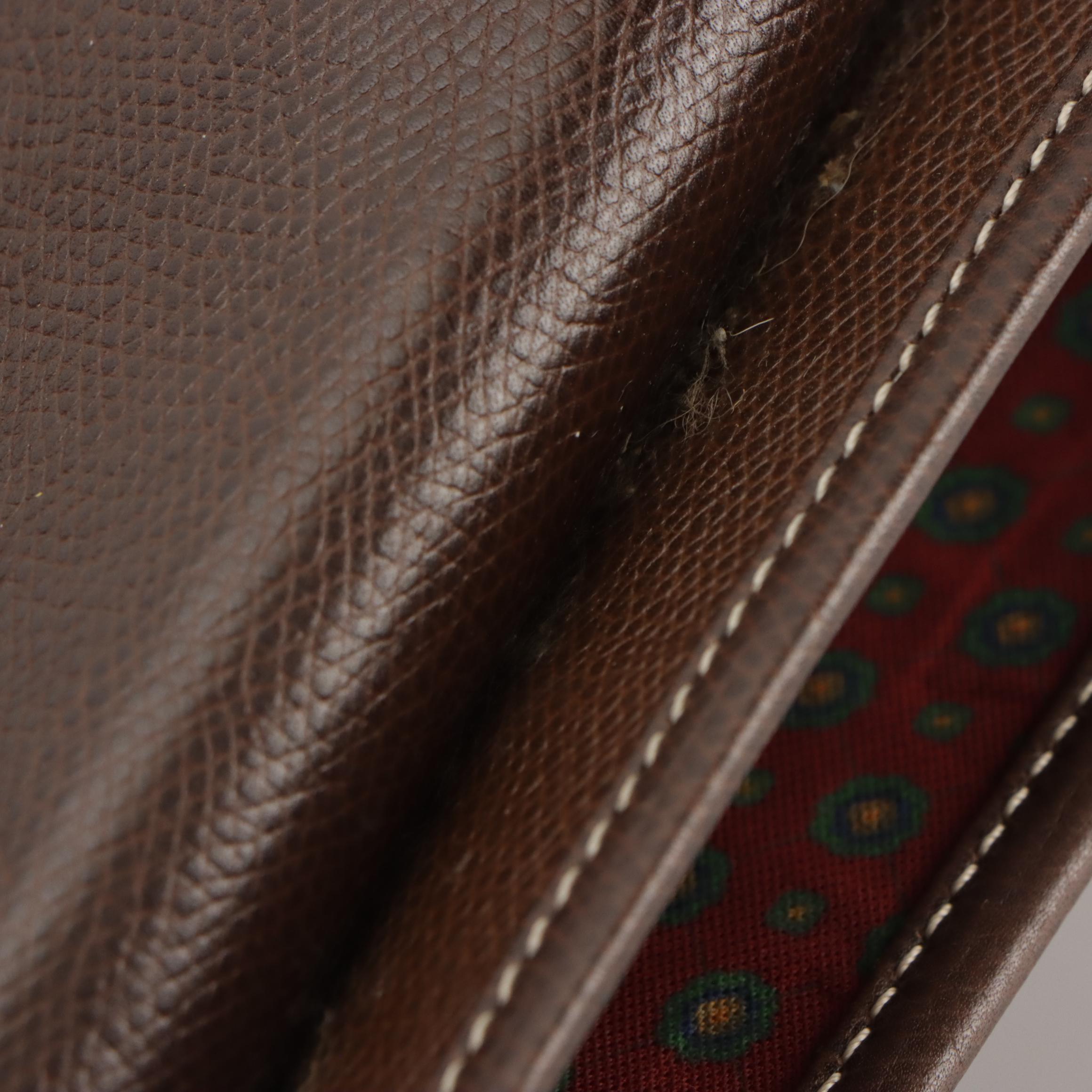 Loewe Vintage Anagram Embossed Crossbody Saddle Bag in Brown Leather, With Box