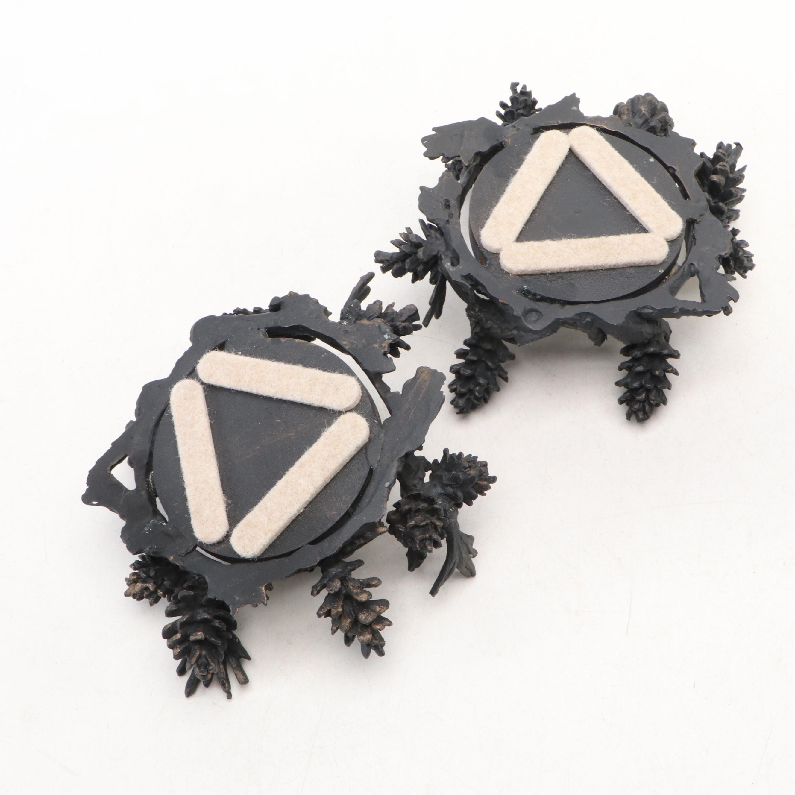 Contemporary Cast Metal Pine Cone Form Candle Holders with Candles