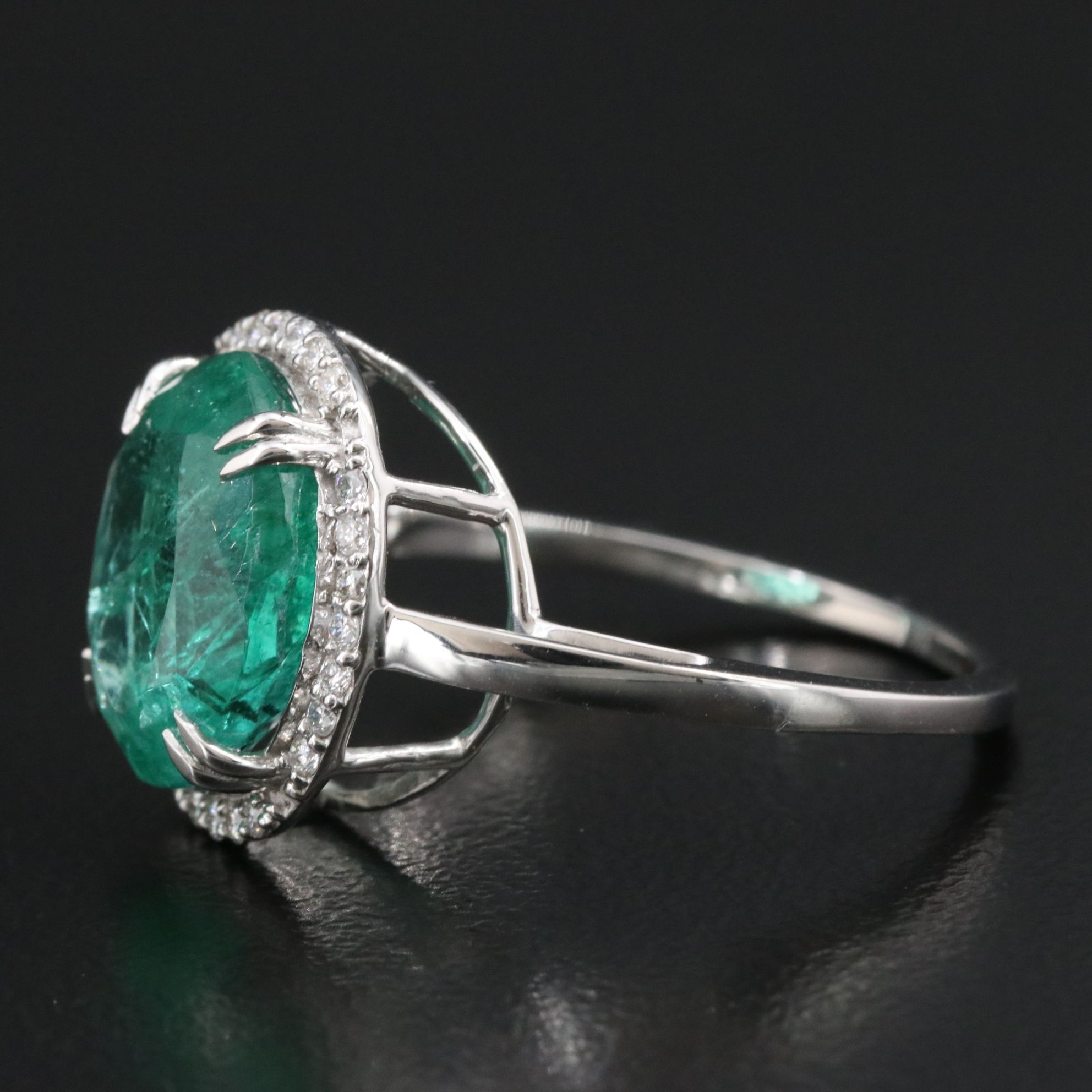 Platinum 4.49 CT Emerald and 0.16 CTW Diamond Ring