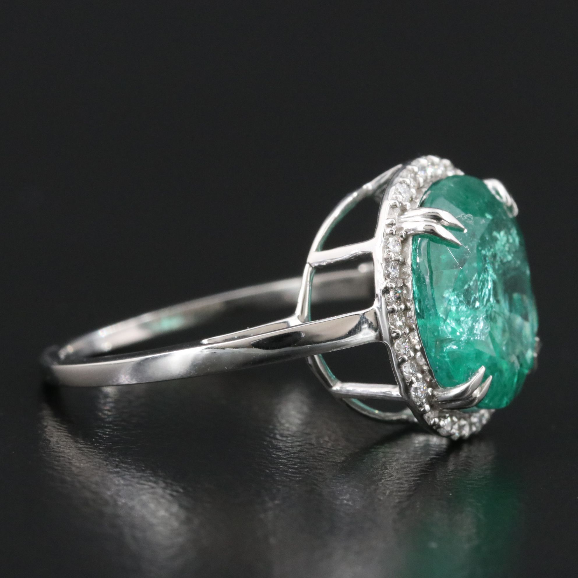 Platinum 4.49 CT Emerald and 0.16 CTW Diamond Ring