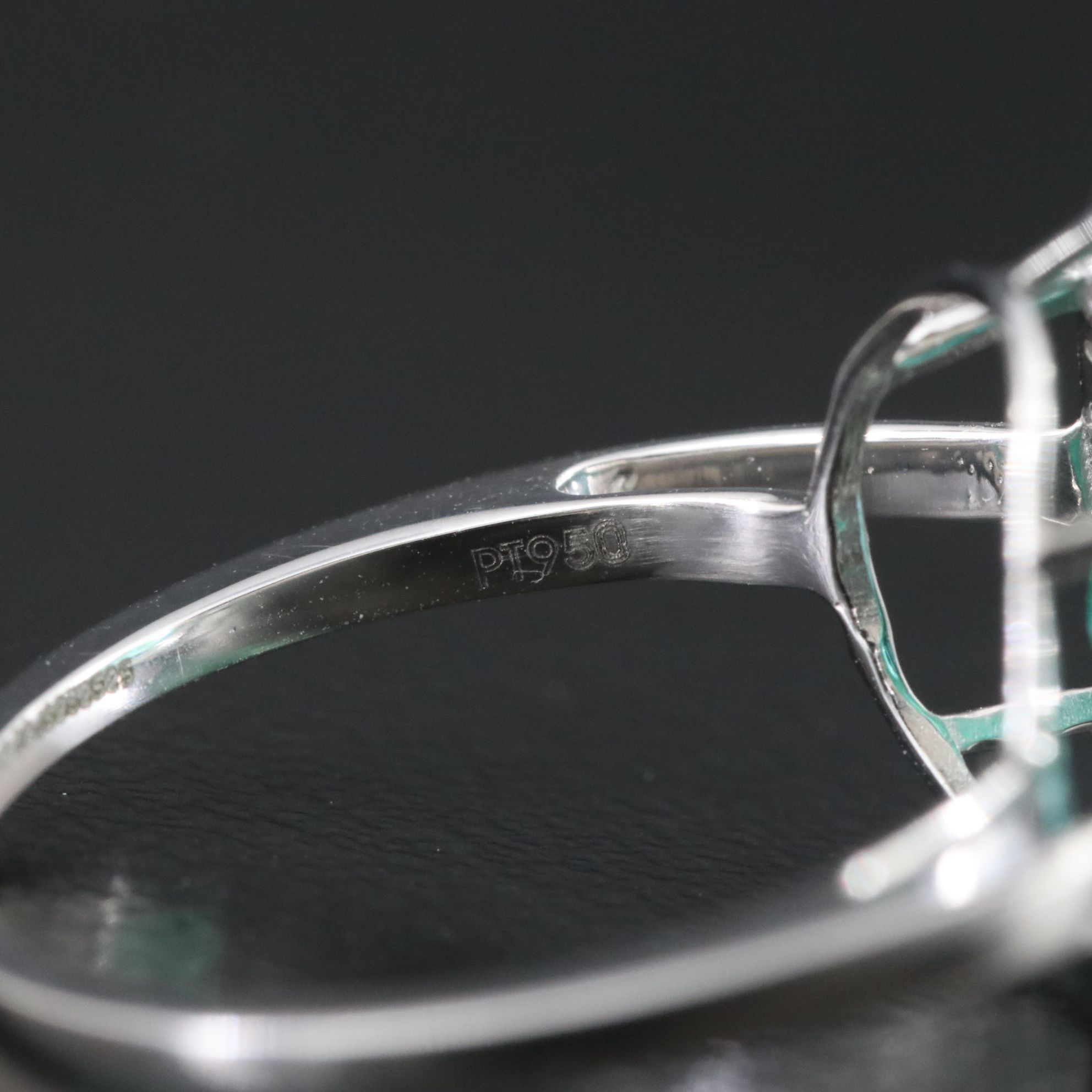 Platinum 4.49 CT Emerald and 0.16 CTW Diamond Ring