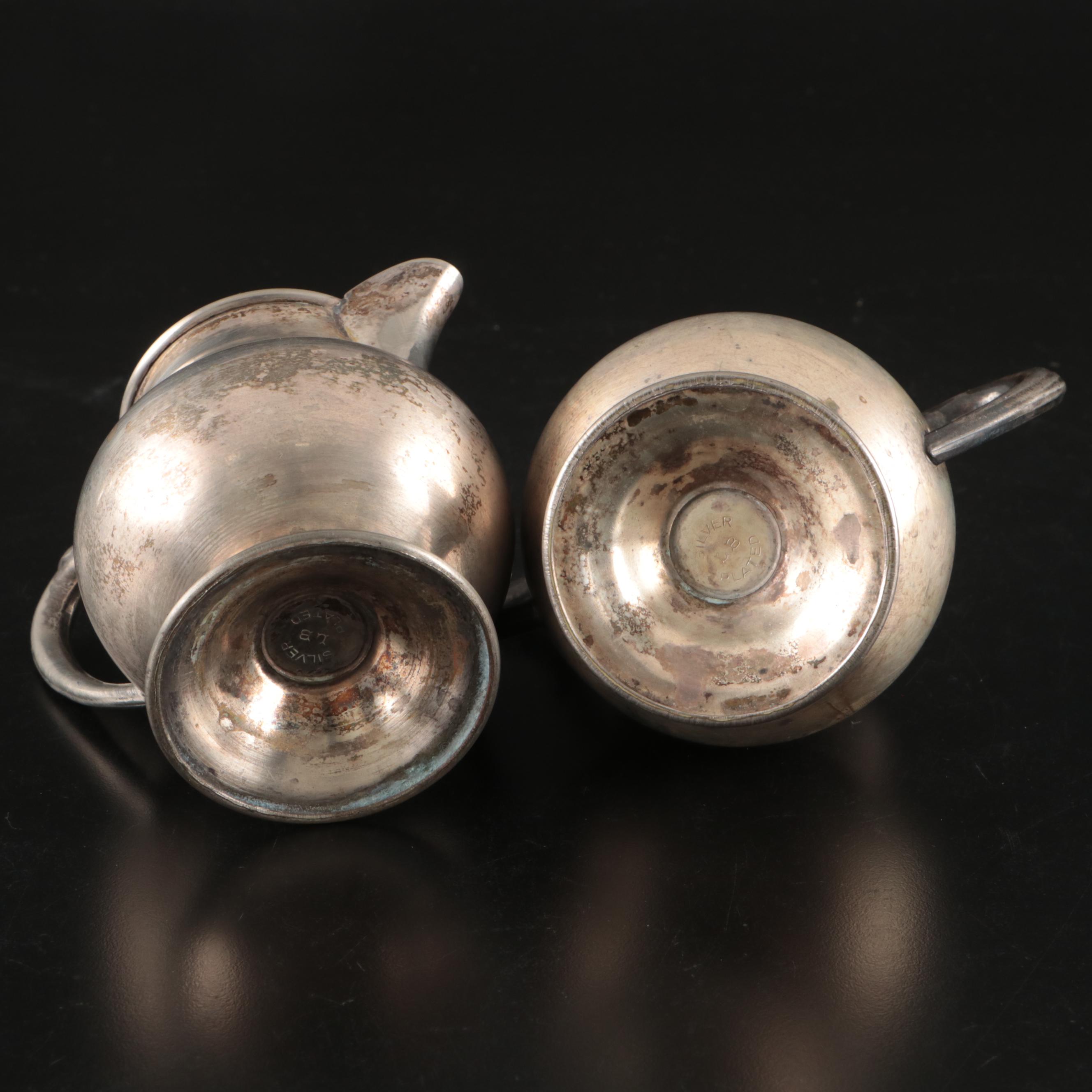 Silver Plate Teapot with Creamer, Sugar, and Shot Glasses with Other Pewter Ware