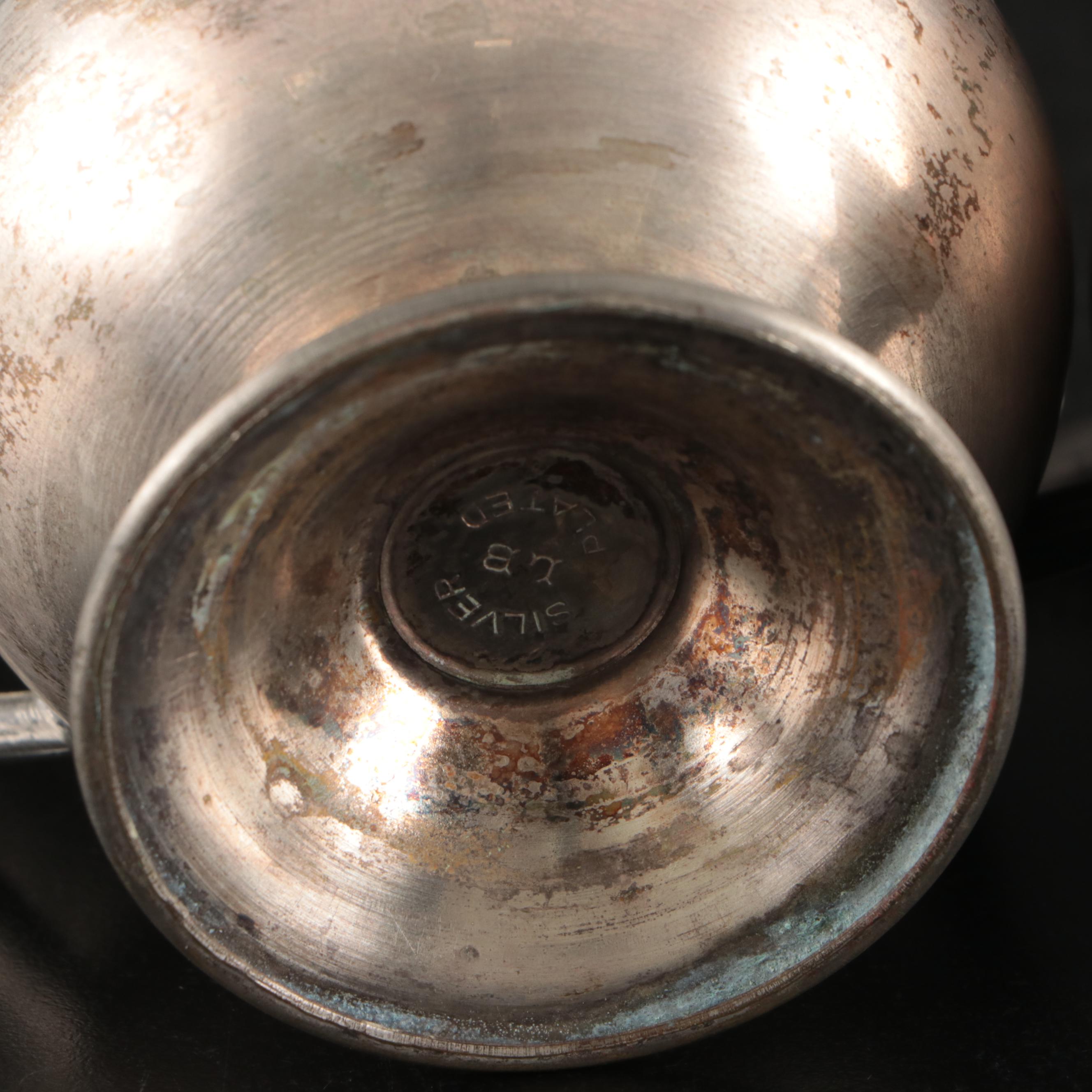 Silver Plate Teapot with Creamer, Sugar, and Shot Glasses with Other Pewter Ware