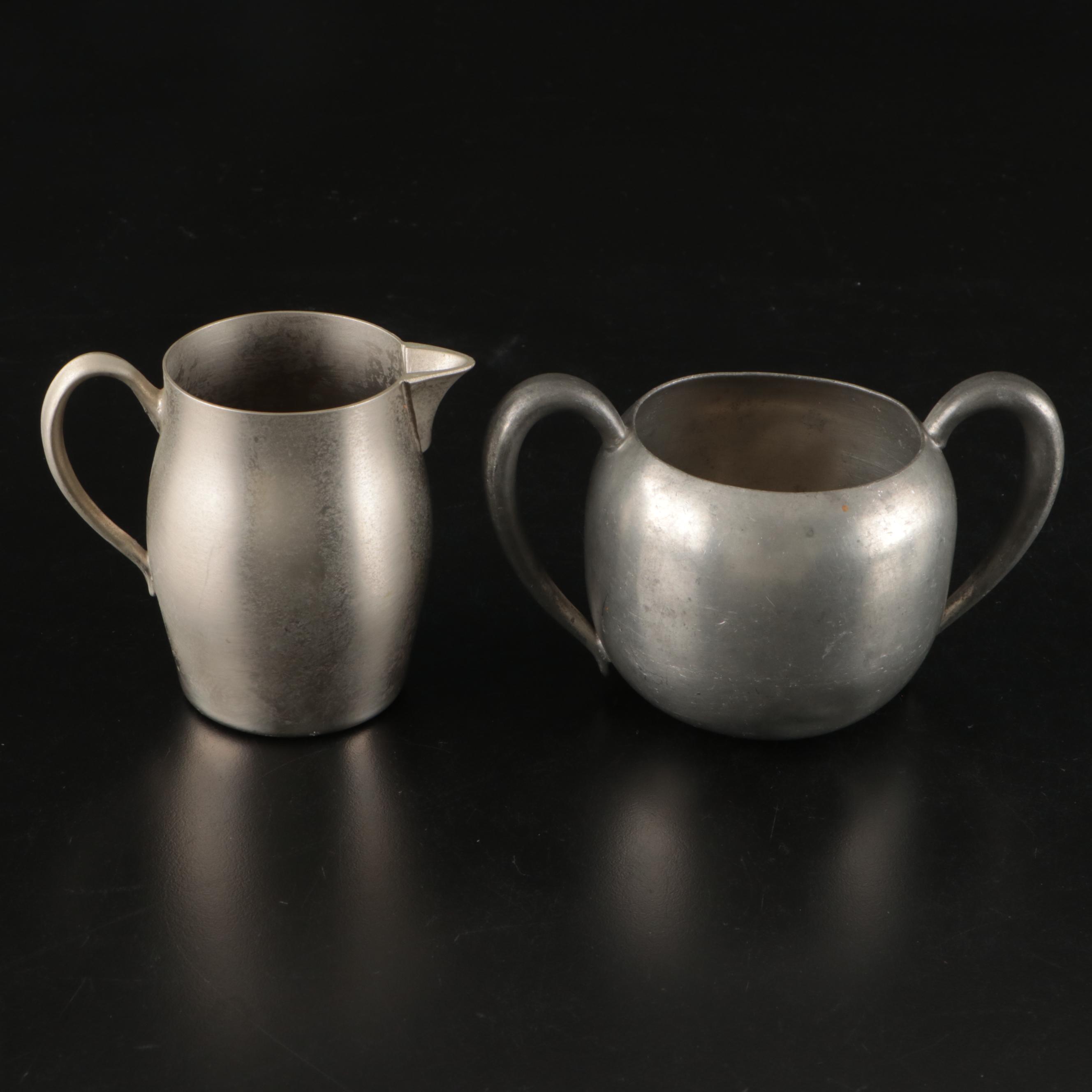 Silver Plate Teapot with Creamer, Sugar, and Shot Glasses with Other Pewter Ware