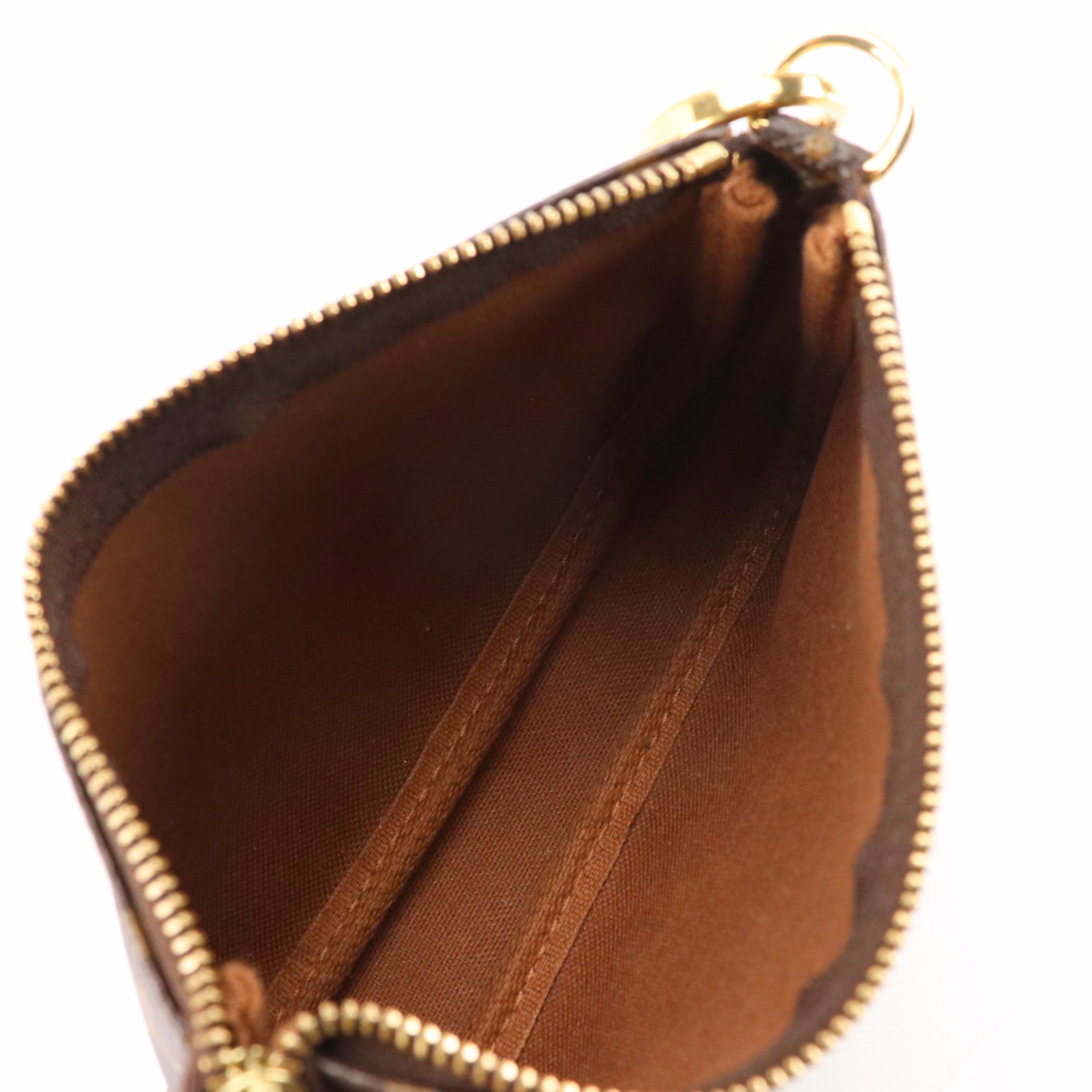 Louis Vuittion '1 Rue Scribe' Monogram Canvas Mini Accessories Pochette Bag