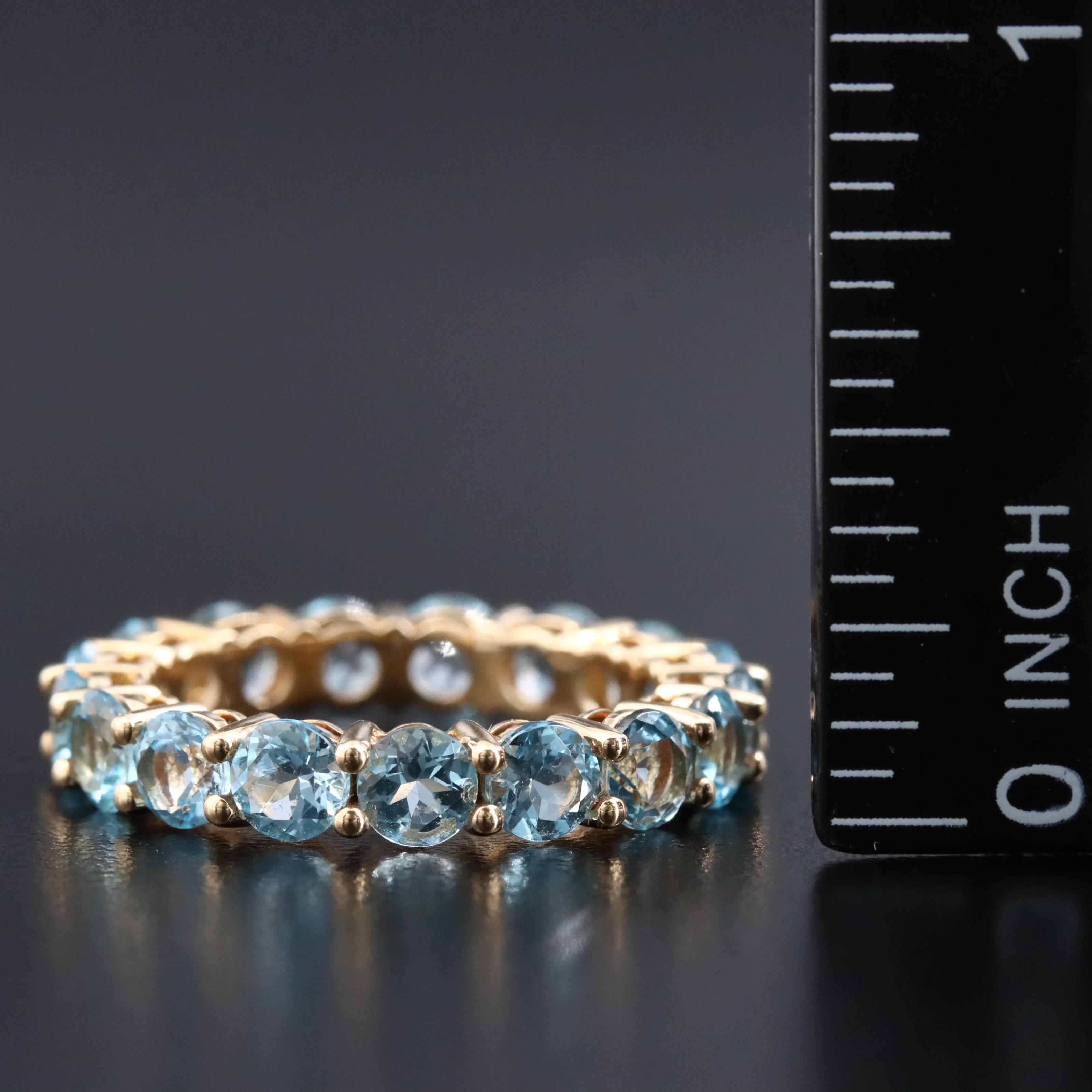 18K Swiss Blue Topaz Eternity Band