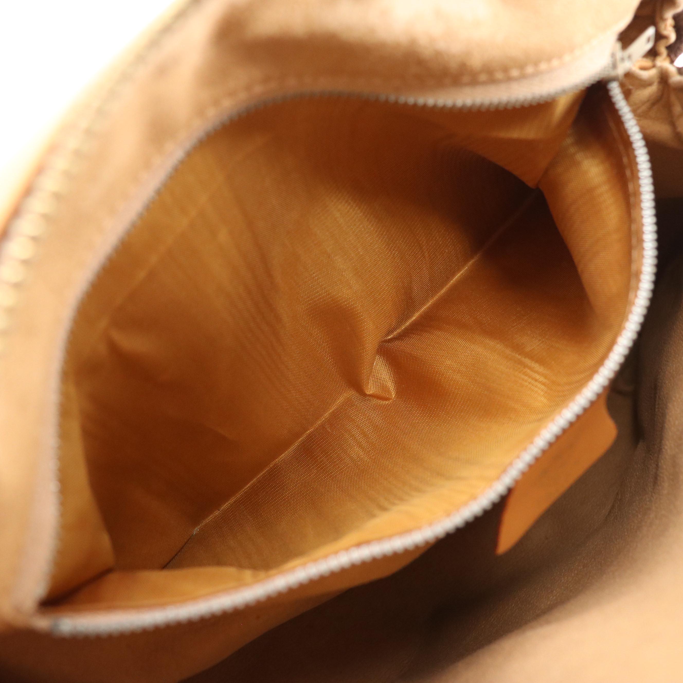 Gucci Boston Bag in Micro GG Coated Canvas and Leather