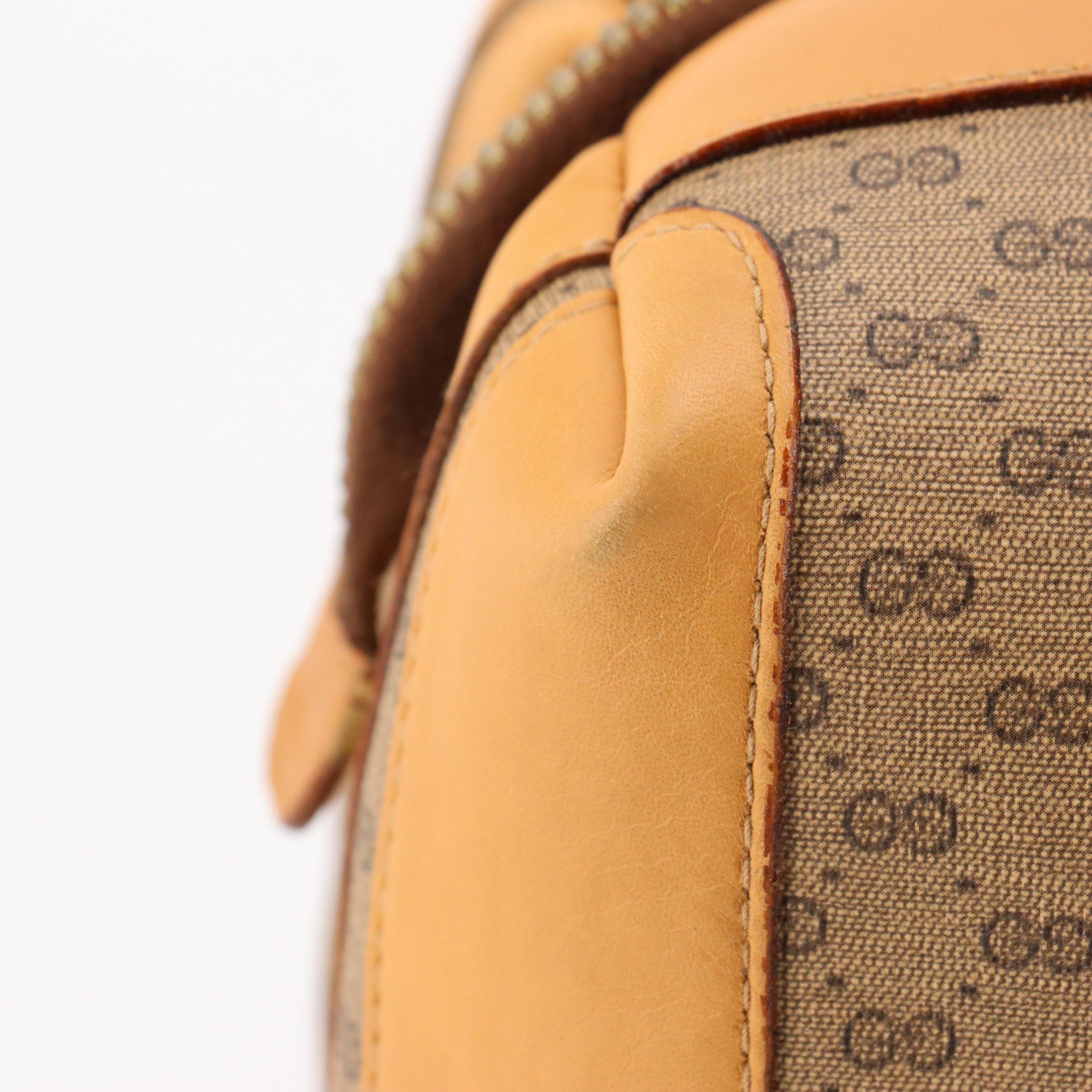 Gucci Boston Bag in Micro GG Coated Canvas and Leather