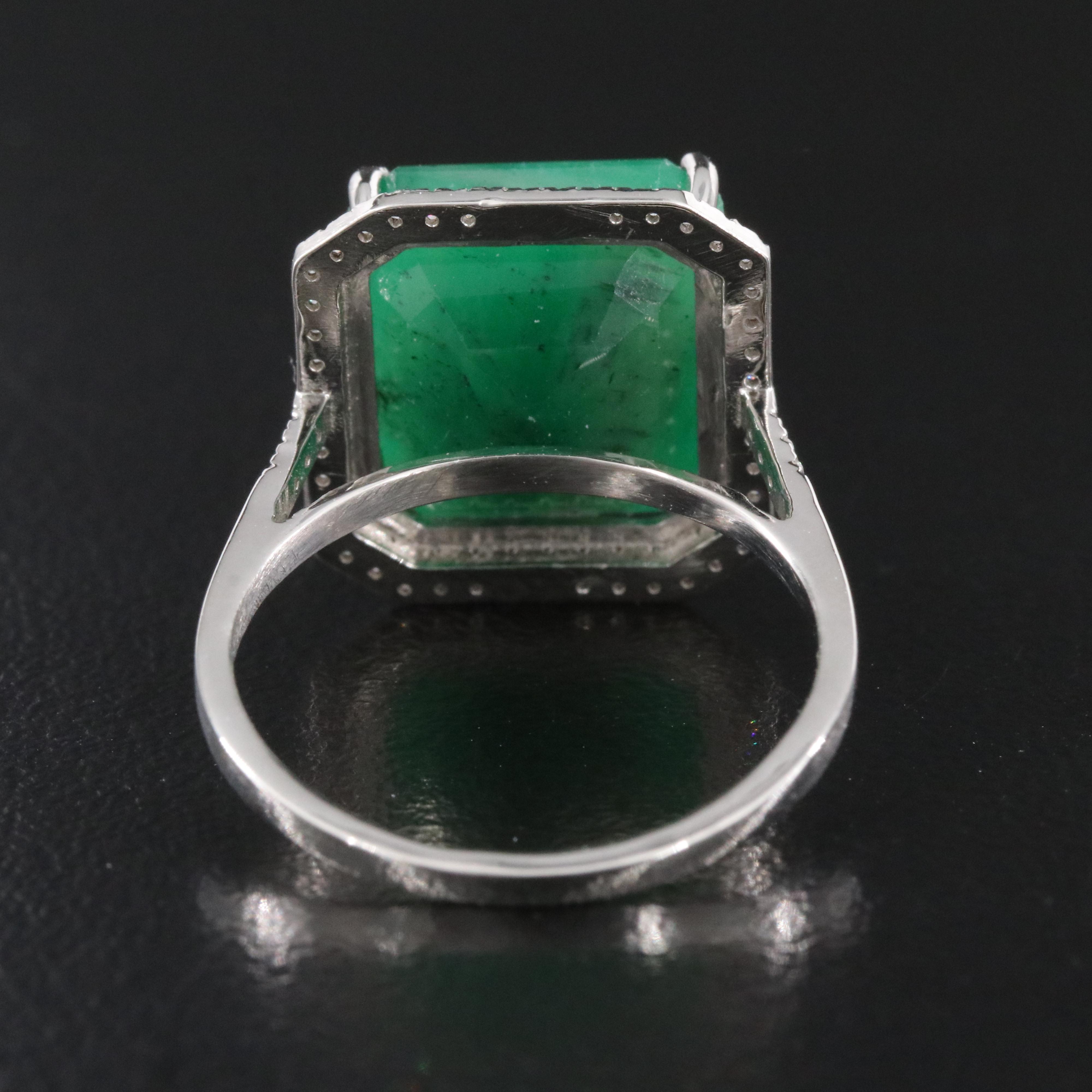 Platinum 8.05 CT Emerald and 0.21 CTW Diamond Ring