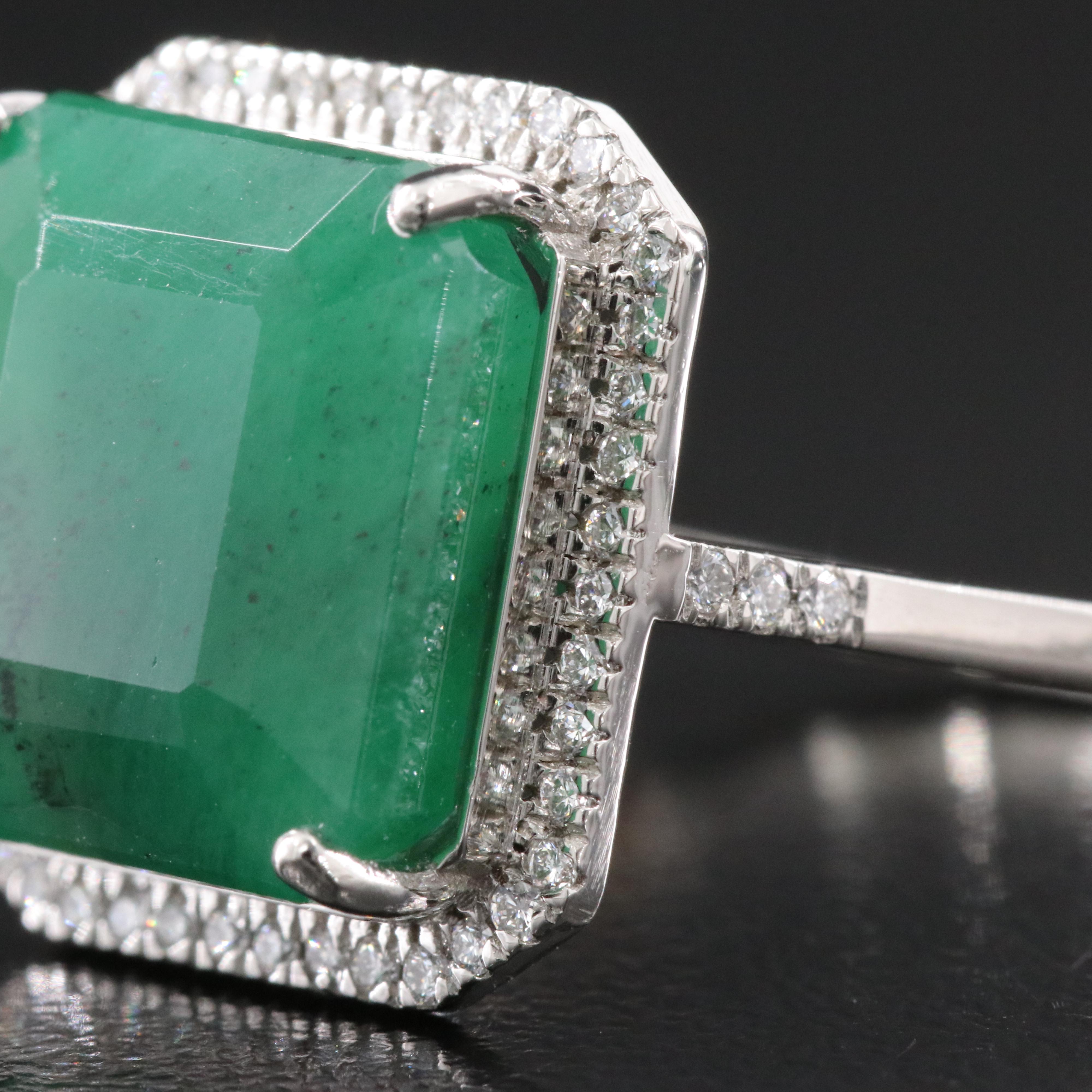 Platinum 8.05 CT Emerald and 0.21 CTW Diamond Ring