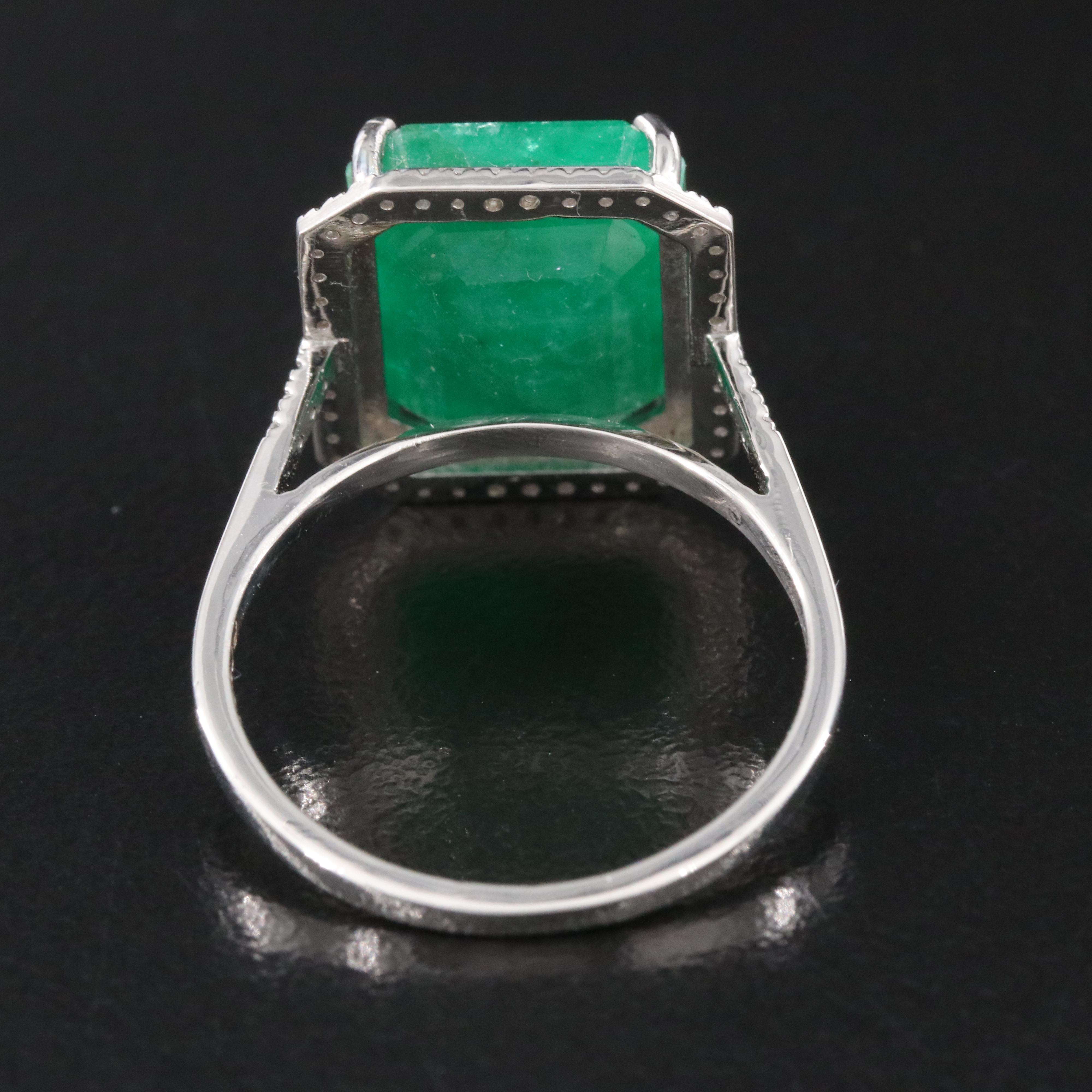 Platinum 7.54 CT Emerald and 0.19 CTW Diamond Ring