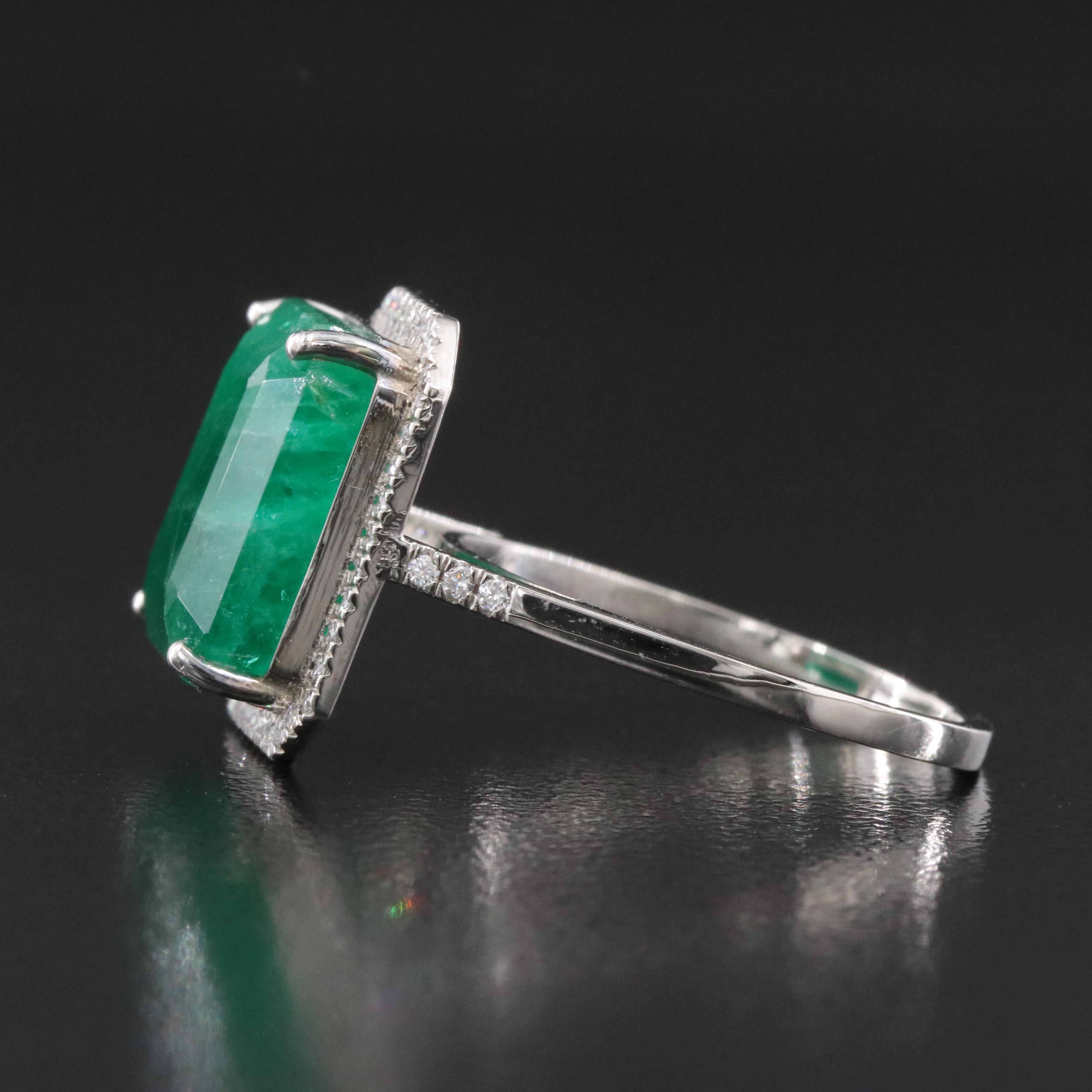 Platinum 7.54 CT Emerald and 0.19 CTW Diamond Ring