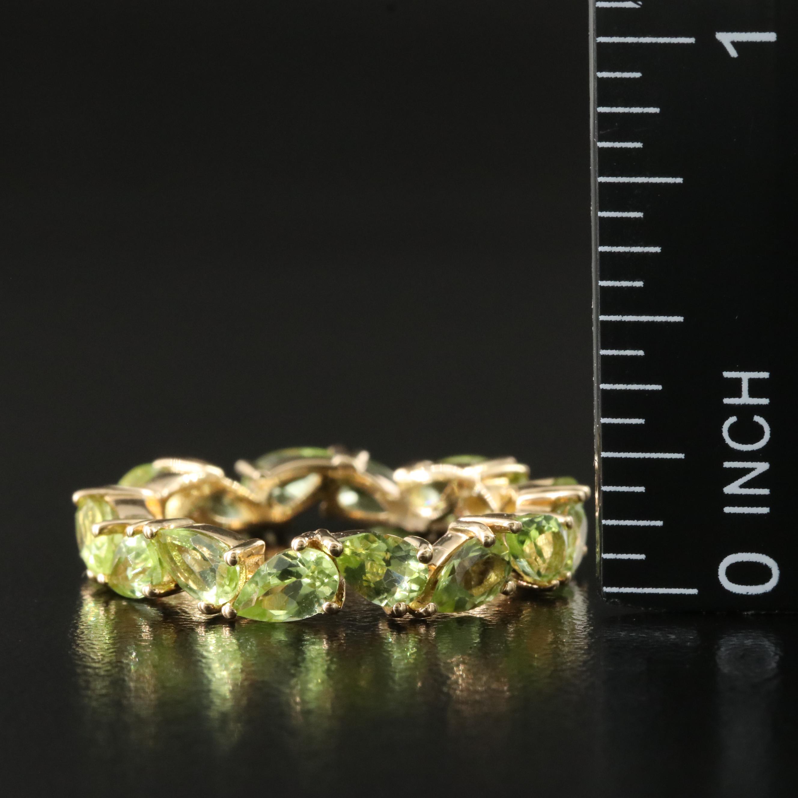 18K Peridot Eternity Band