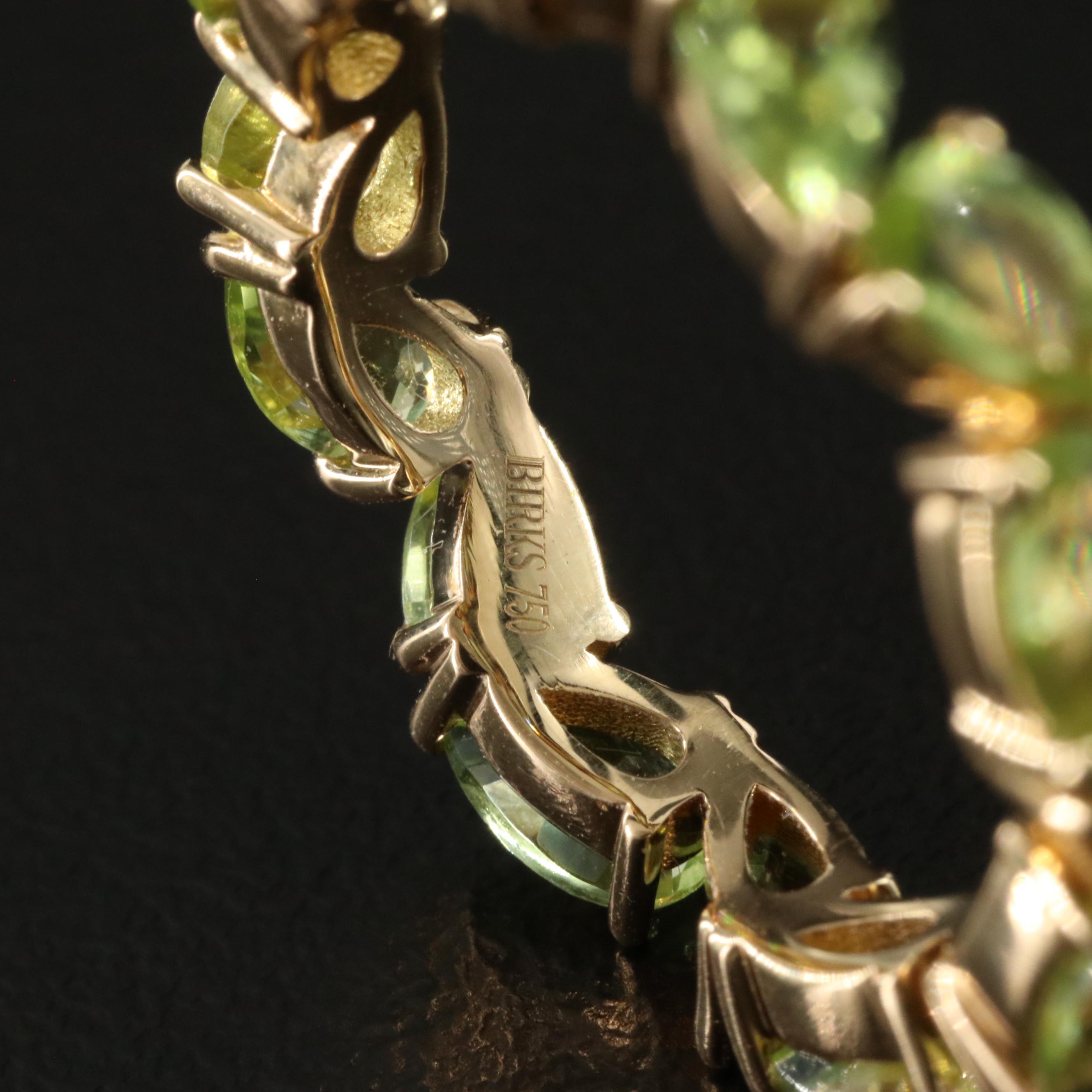 18K Peridot Eternity Band