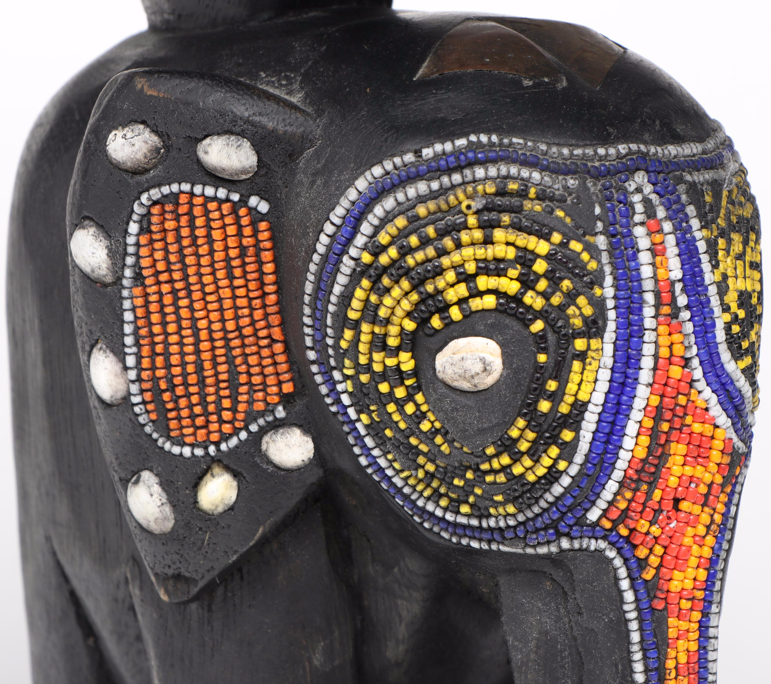 Handcrafted Wooden Elephant Accent Table with Beaded Embellishments