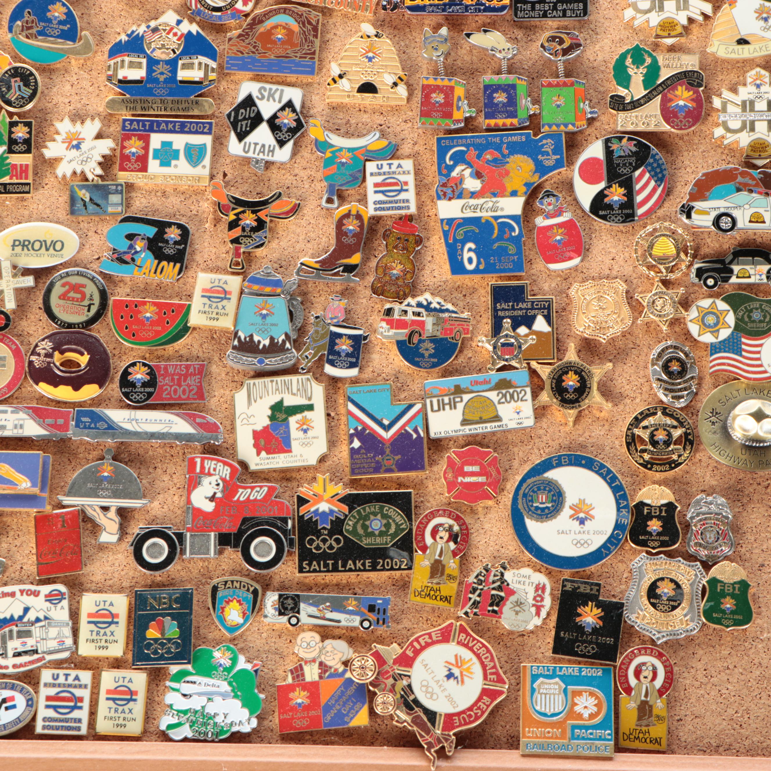 Vintage Olympic and Other Themed Enamel Pinback Collection on Cork Board