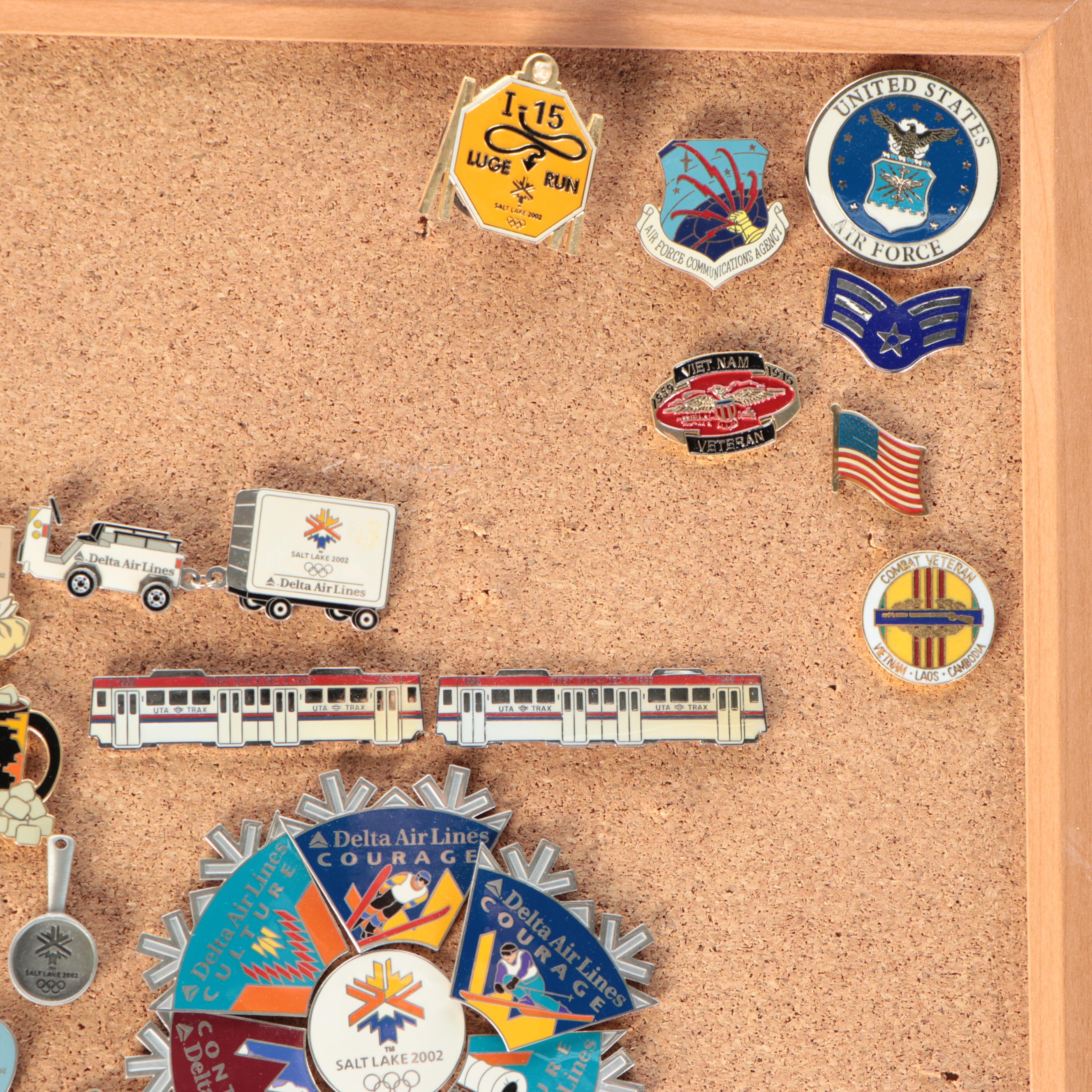 Vintage Olympic and Other Themed Enamel Pinback Collection on Cork Board