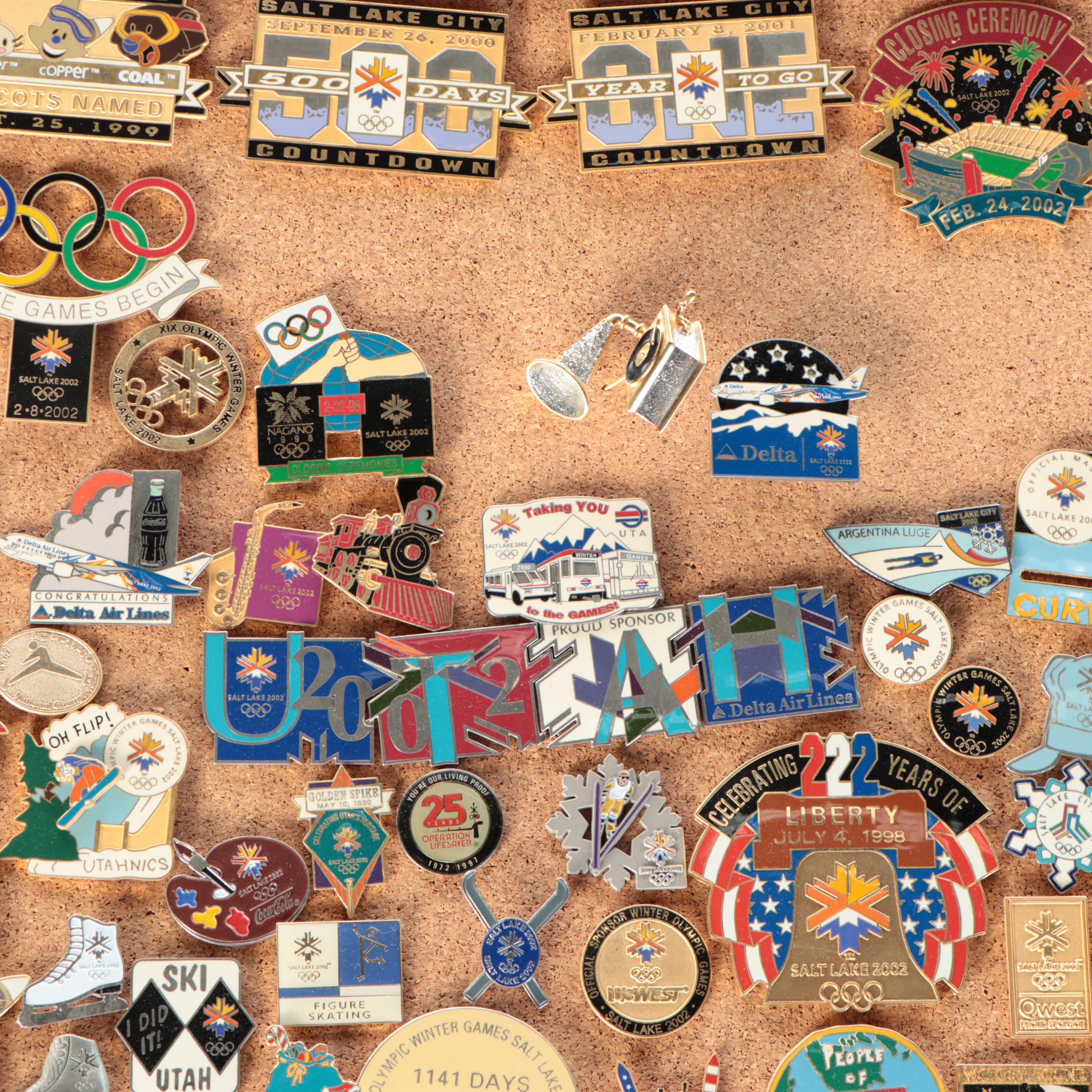 Vintage Olympic and Other Themed Enamel Pinback Collection on Cork Board