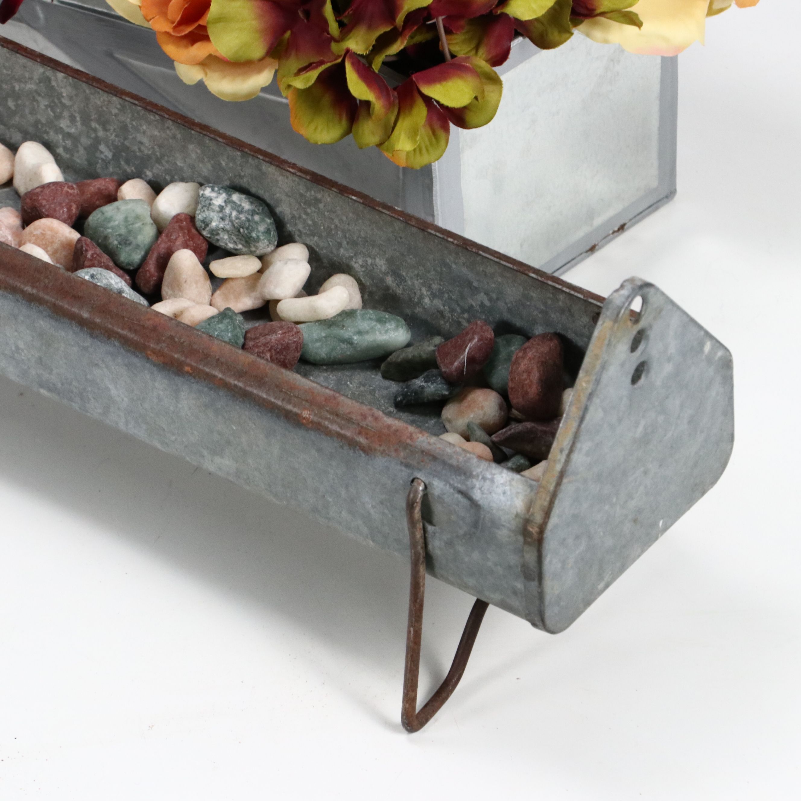 Rustic Farmhouse Style Artificial Flowers with Metal Chicken Trough and Stones