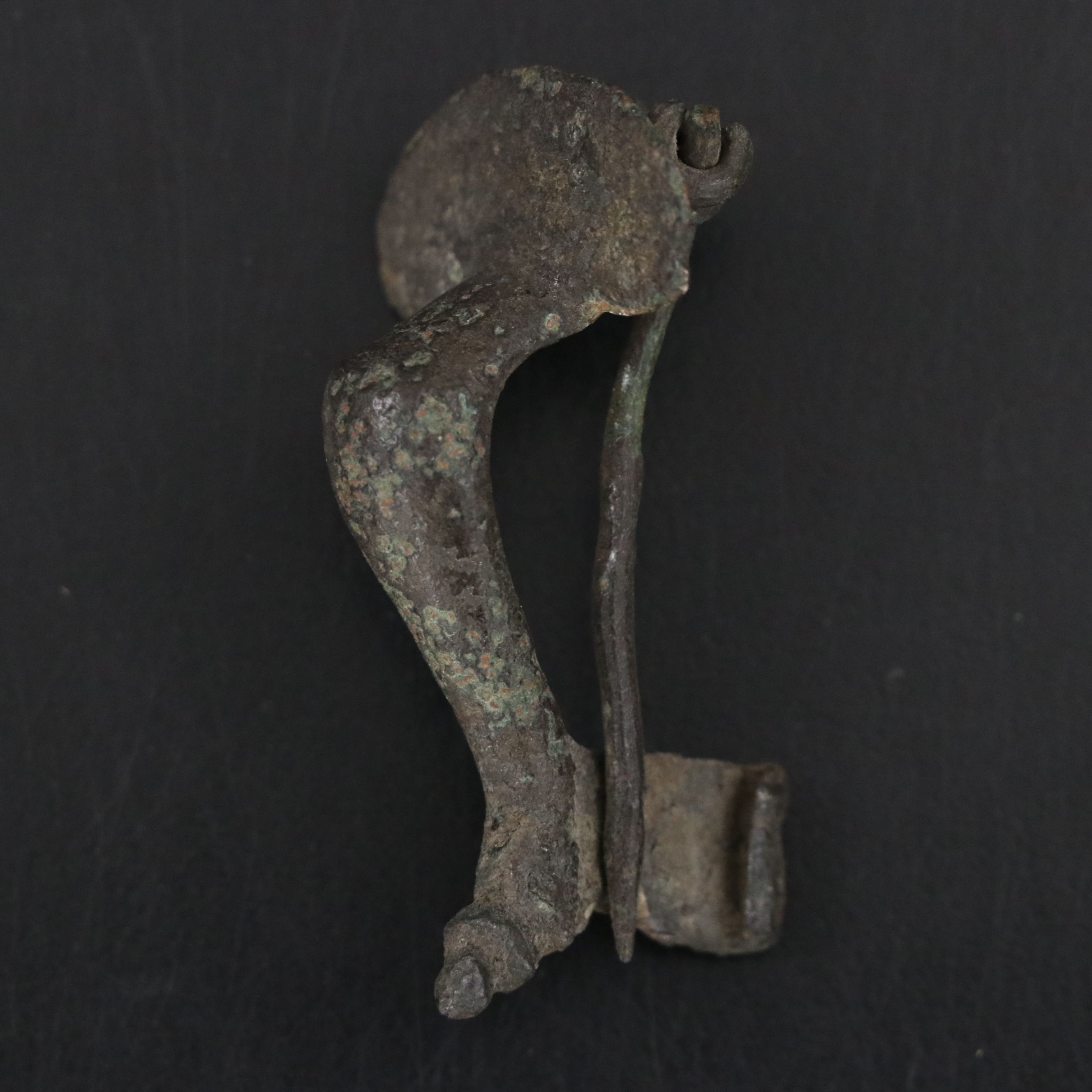 Roman Bronze Fibula, Byzantine Token and Egyptian Faience Amulet